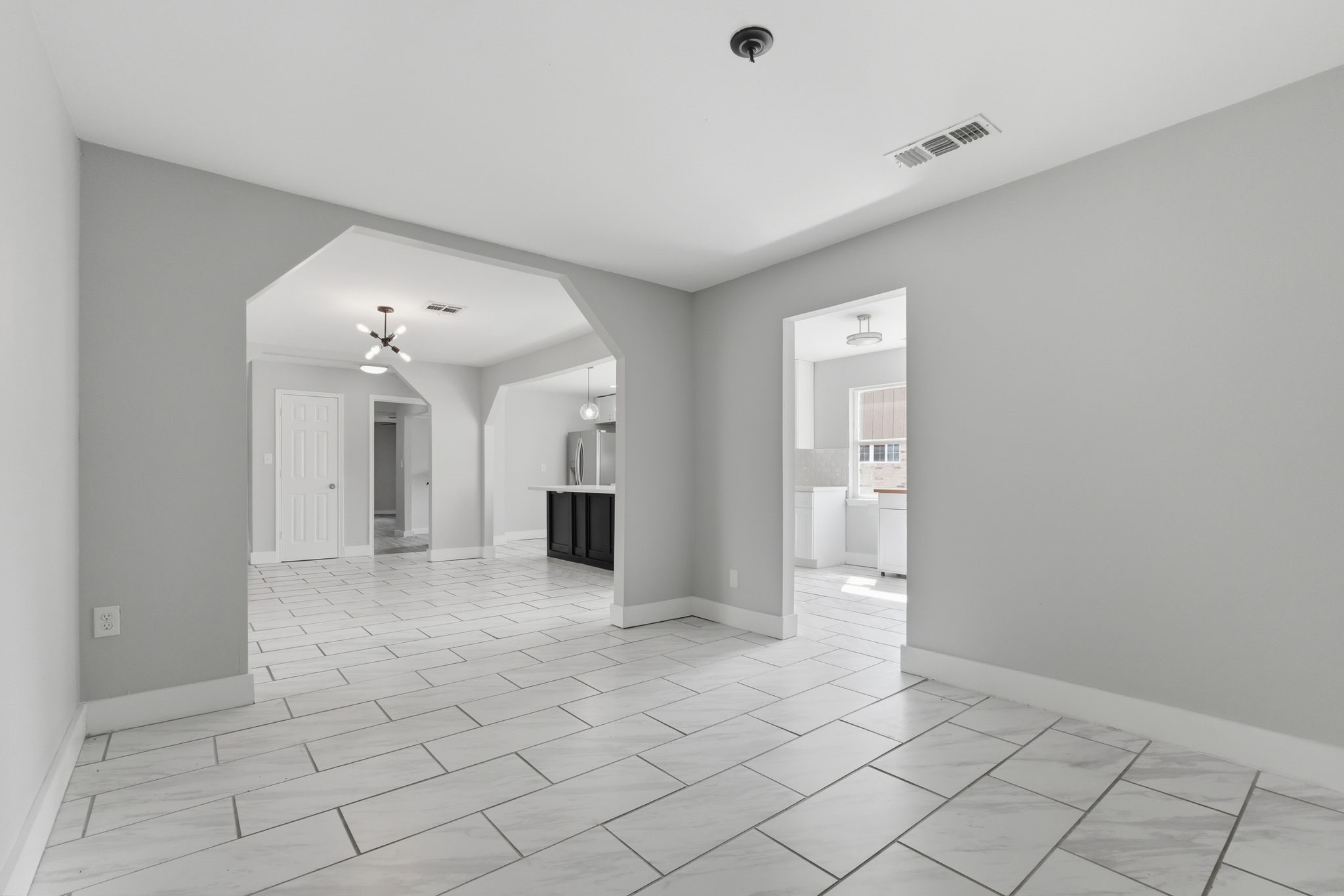 The open-concept dining area seamlessly connects to the kitchen for easy entertaining.