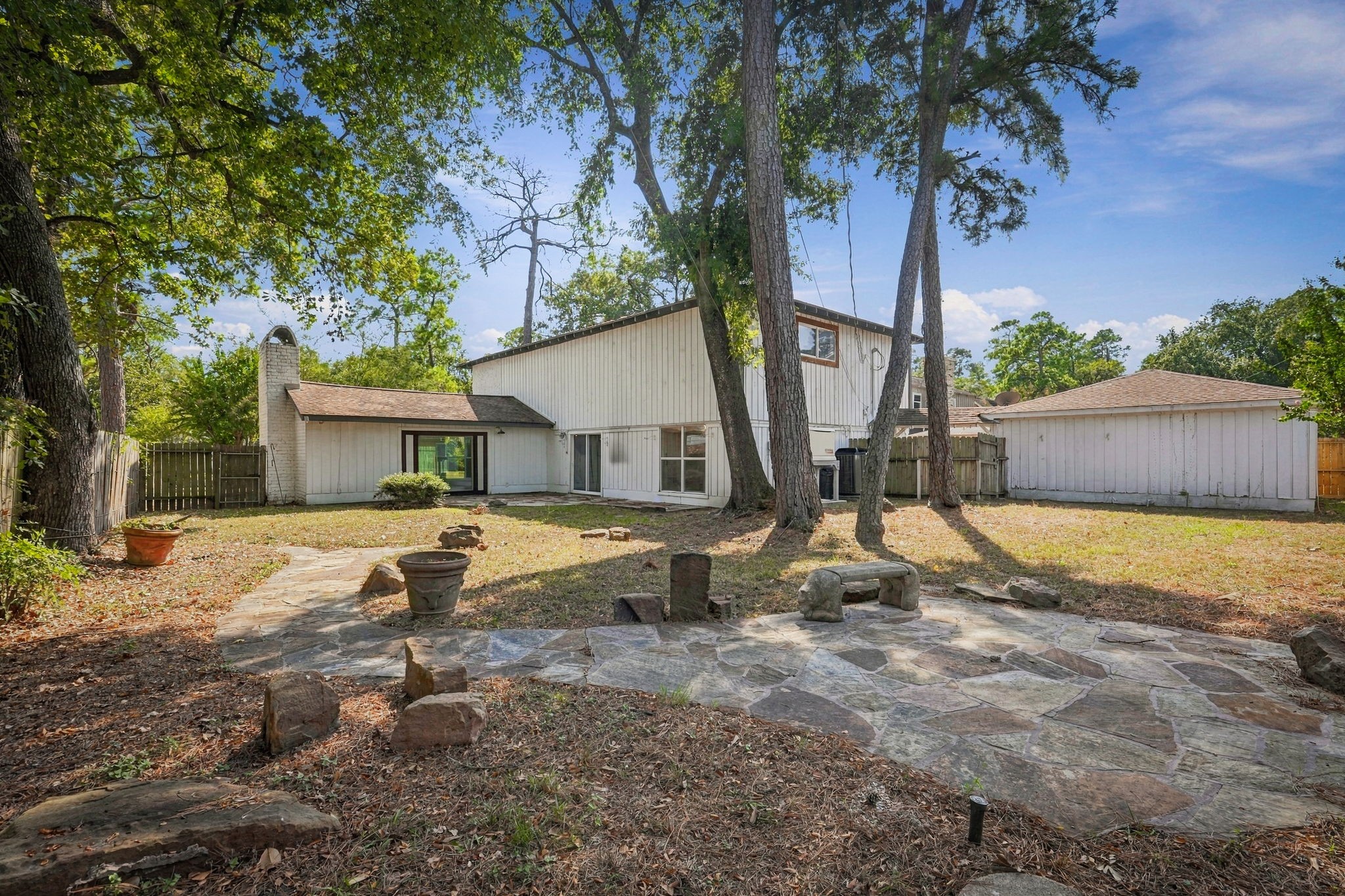 This spacious, fully fenced backyard is perfect for entertaining and outdoor activities.