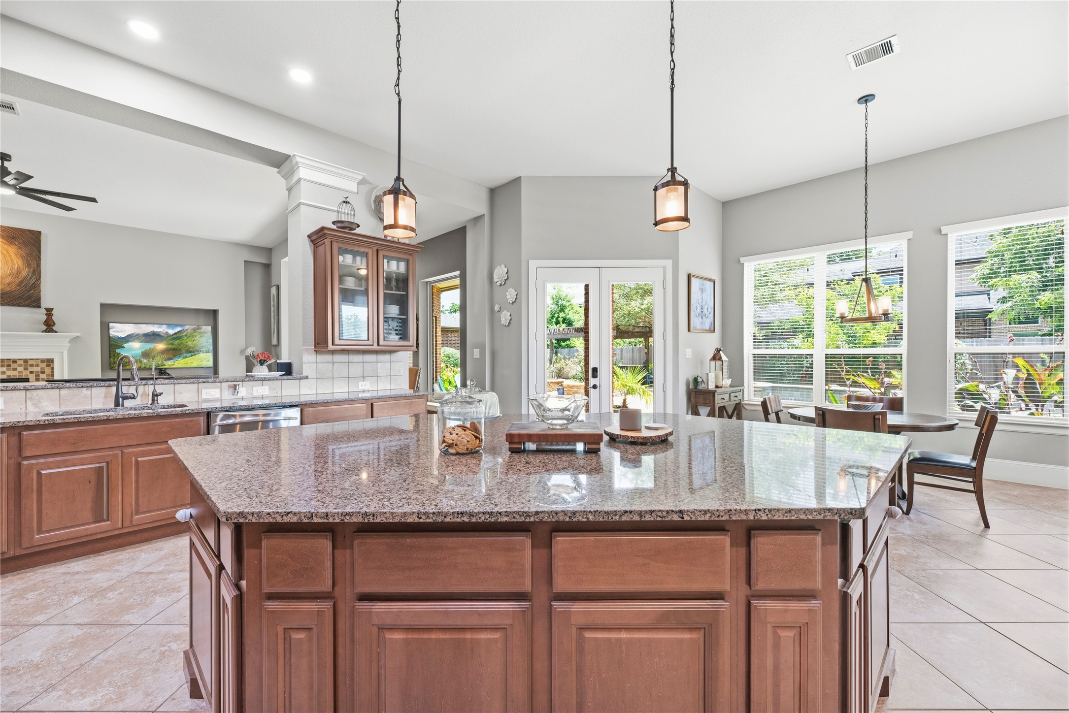 oversized kitchen island offering an abundance of space.