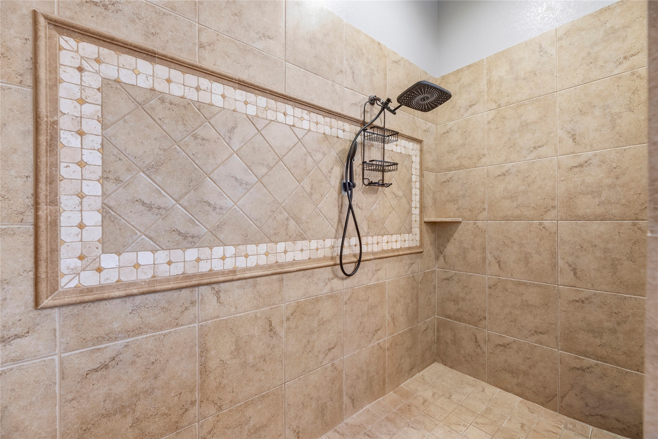 Beautiful tile surrounded oversized walk-in shower