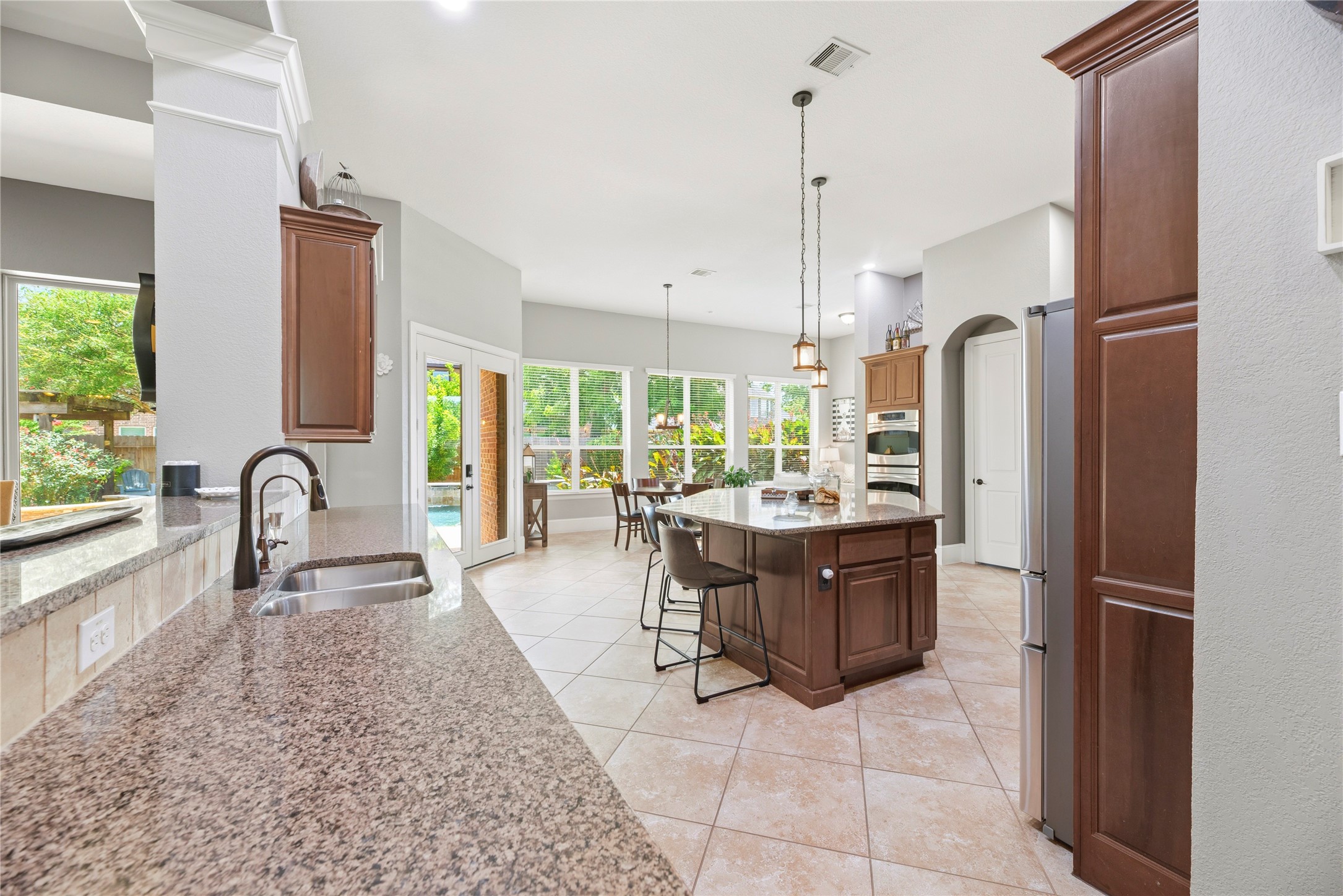 Expansive kitchen with an abundance of cabinet and counter space.