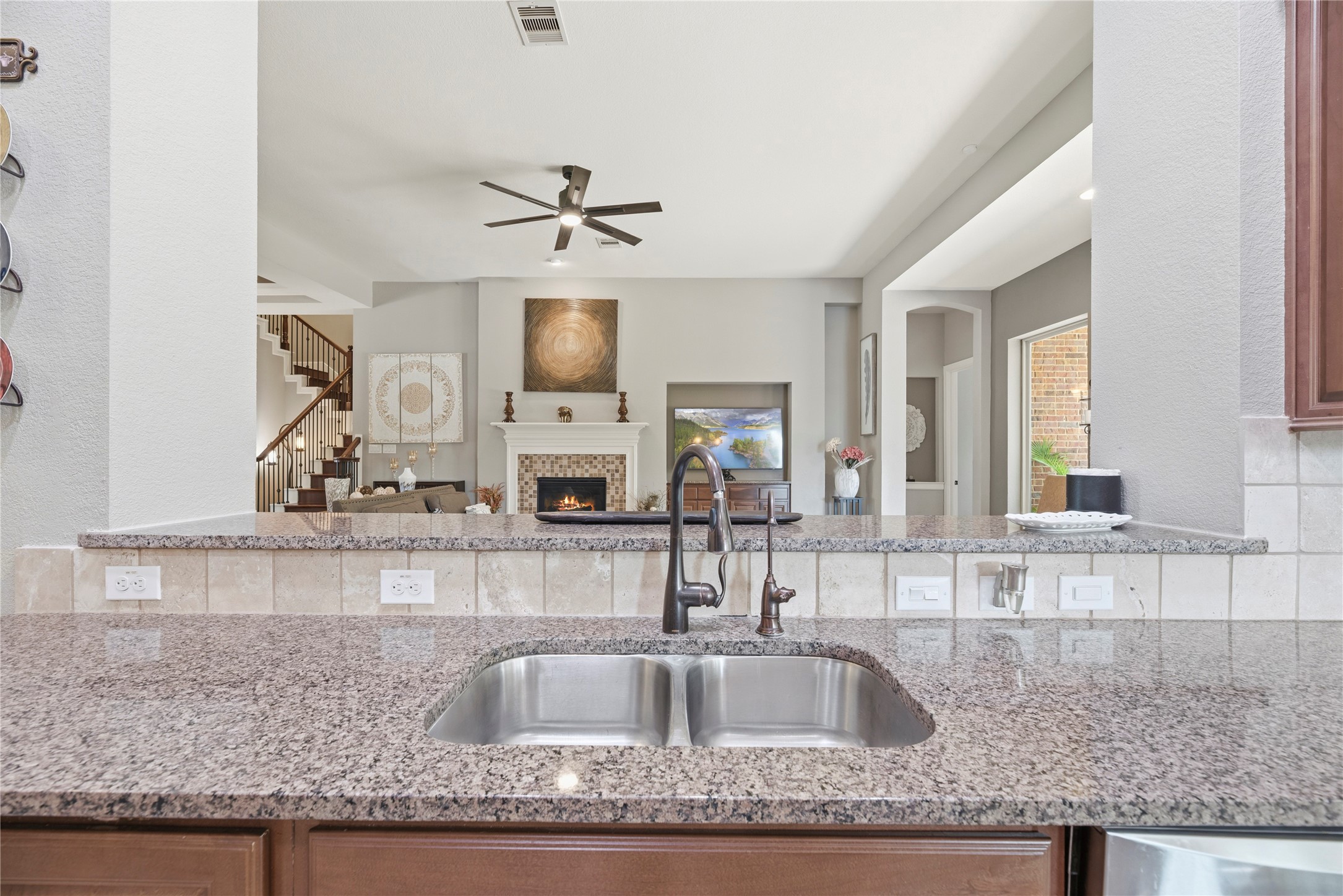 Never miss out on the action with this semi-open concept.