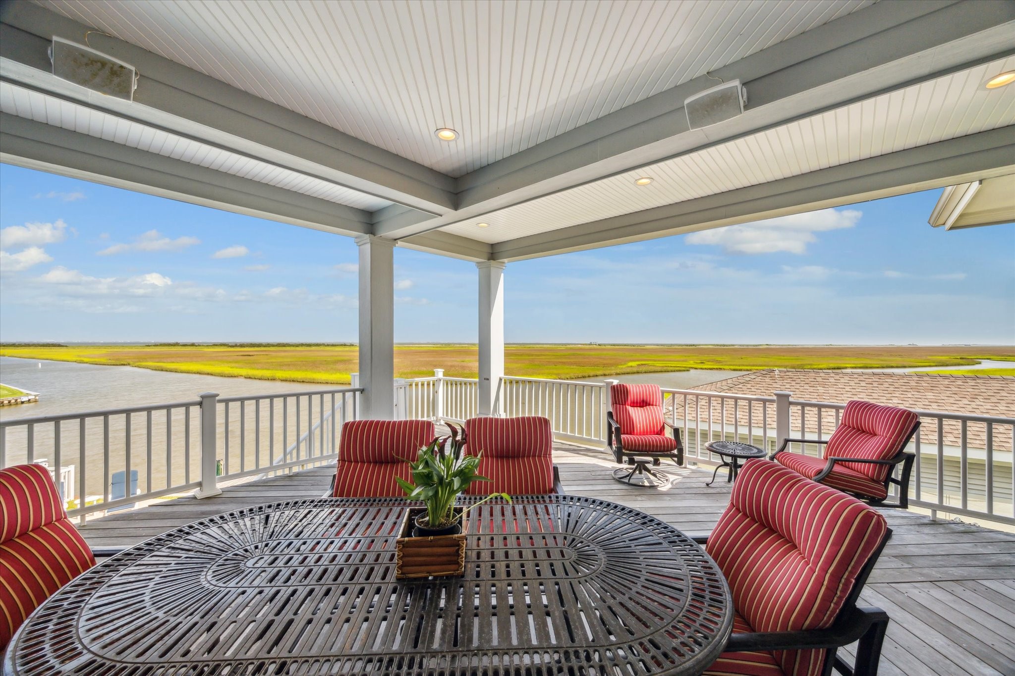Enjoy a front-row seat to natures untouched beauty from the back covered patio