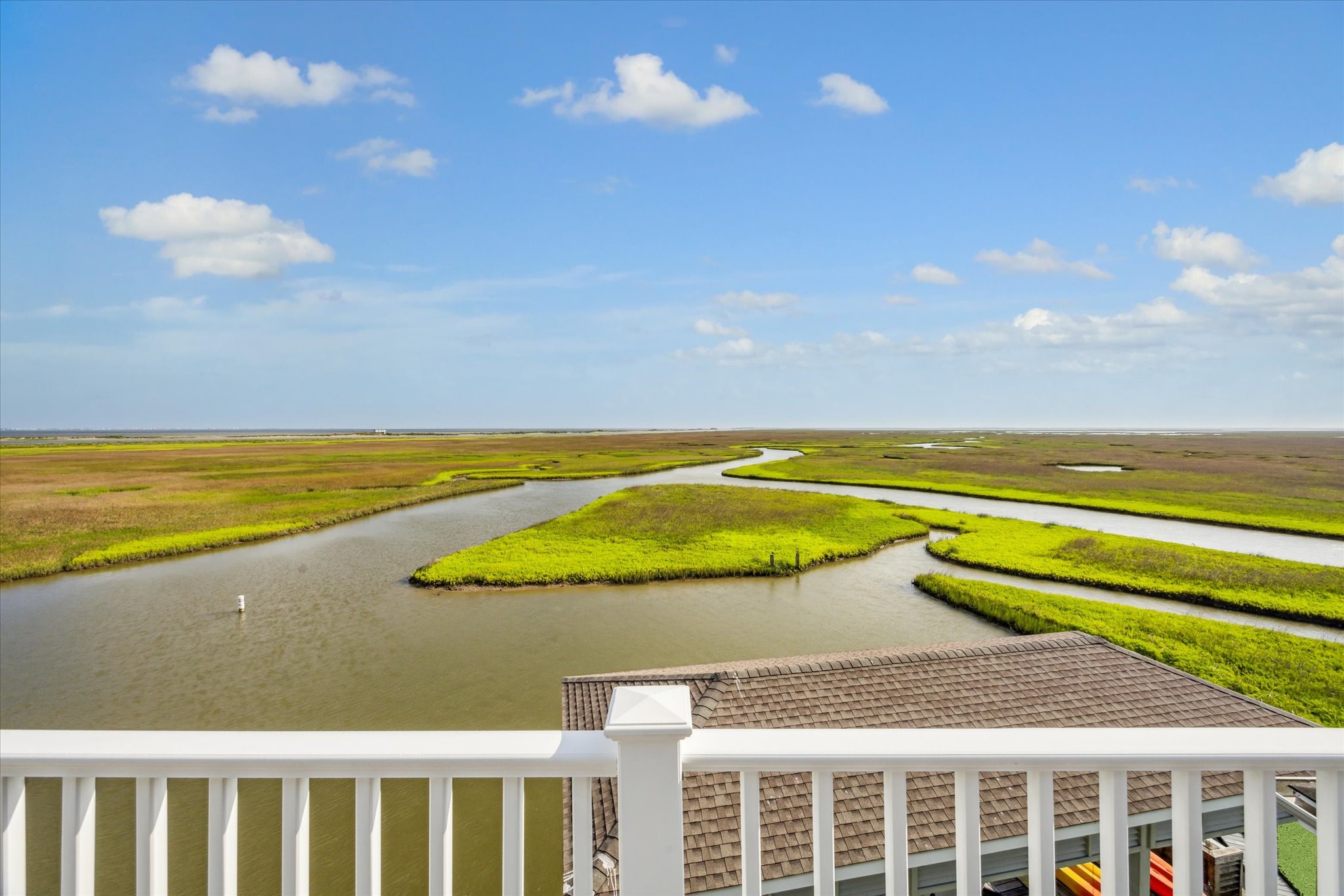 Enjoy breathtaking, unobstructed views from your own home overlooking tranquil coastal waters, lush wetlands, and winding channels