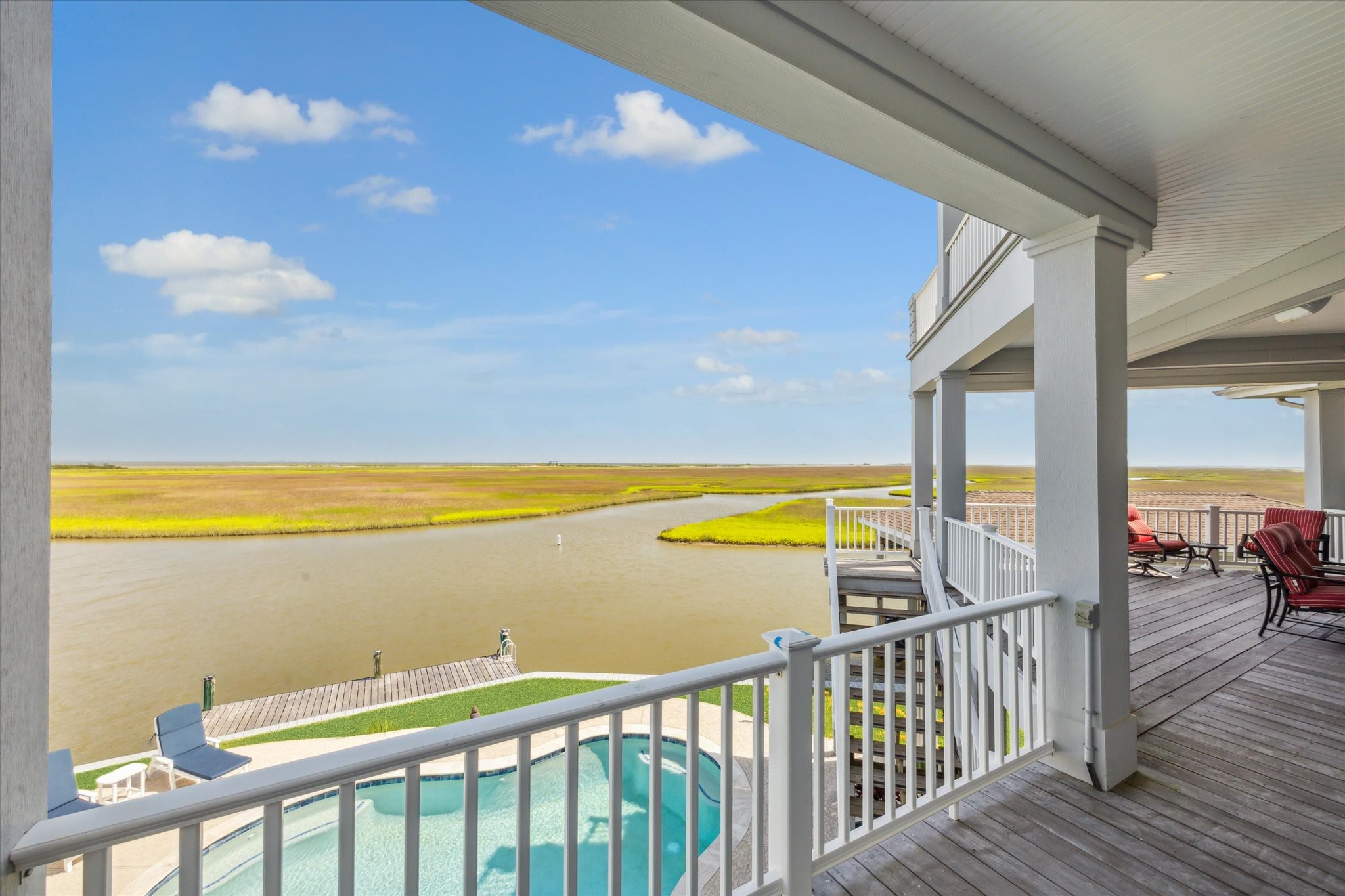 Overlooking the scenic beauty of West Galveston Bay, it offers a seamless extension of the indoor living space, inviting you to enjoy breathtaking sunsets, warm Gulf breezes, and the laid-back luxury of life on the water. Whether hosting gatherings or unwinding with a from the day, this patio embodies the relaxed, waterfront lifestyle that defines West Galveston Bay living