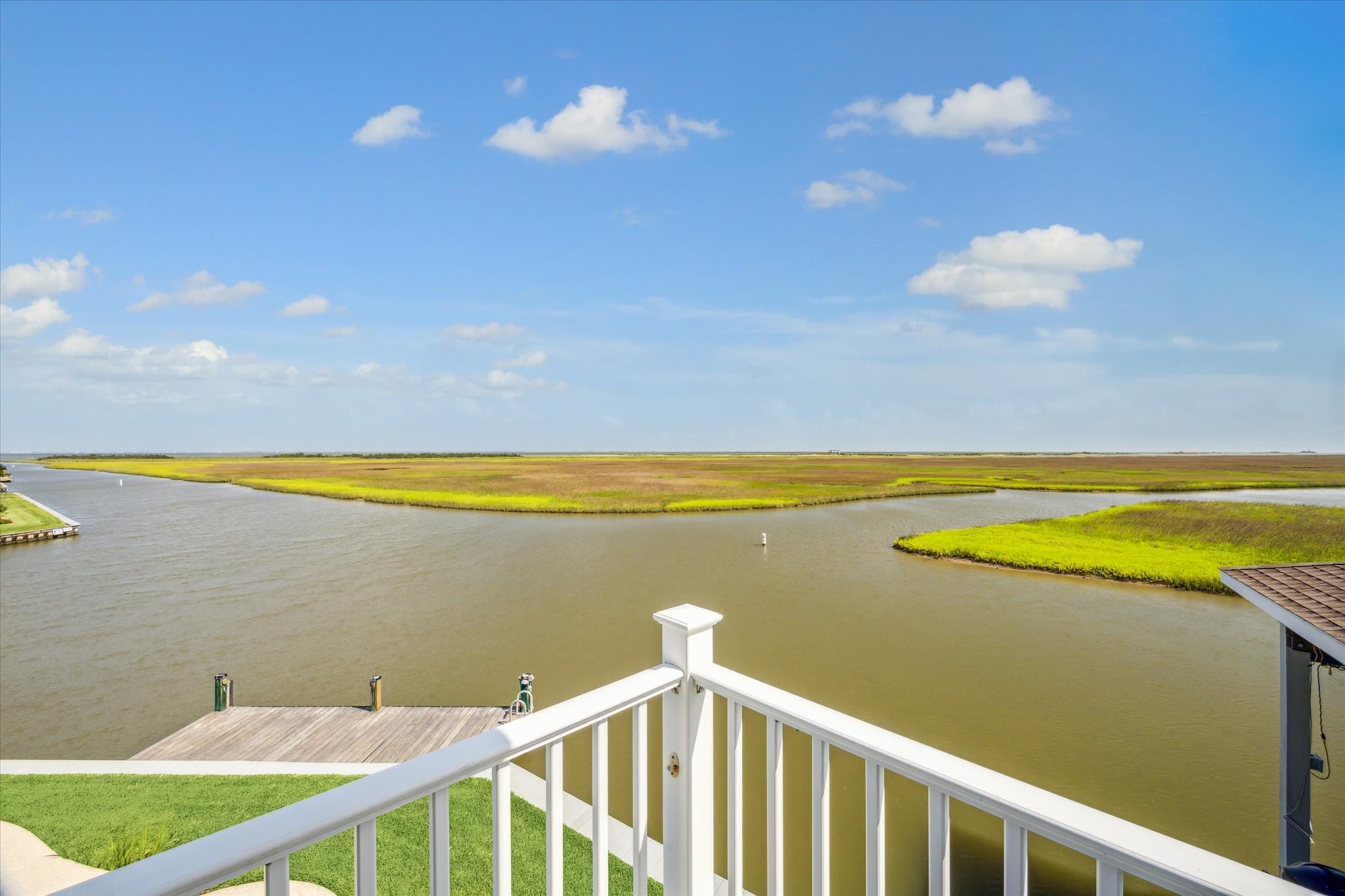 This elevated vantage point offers a front-row seat to natures beauty, with panoramic vistas that stretch across West Galveston Bay and beyondperfect for soaking in vibrant sunsets and serene waterfront living