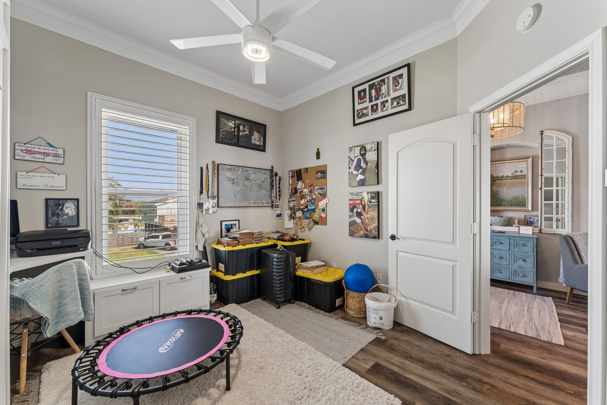 Versatile secondary bedroom offers a built in window seat and space for work, hobbies, or guests. Natural light and thoughtful details make this room adaptable to a variety of needs.