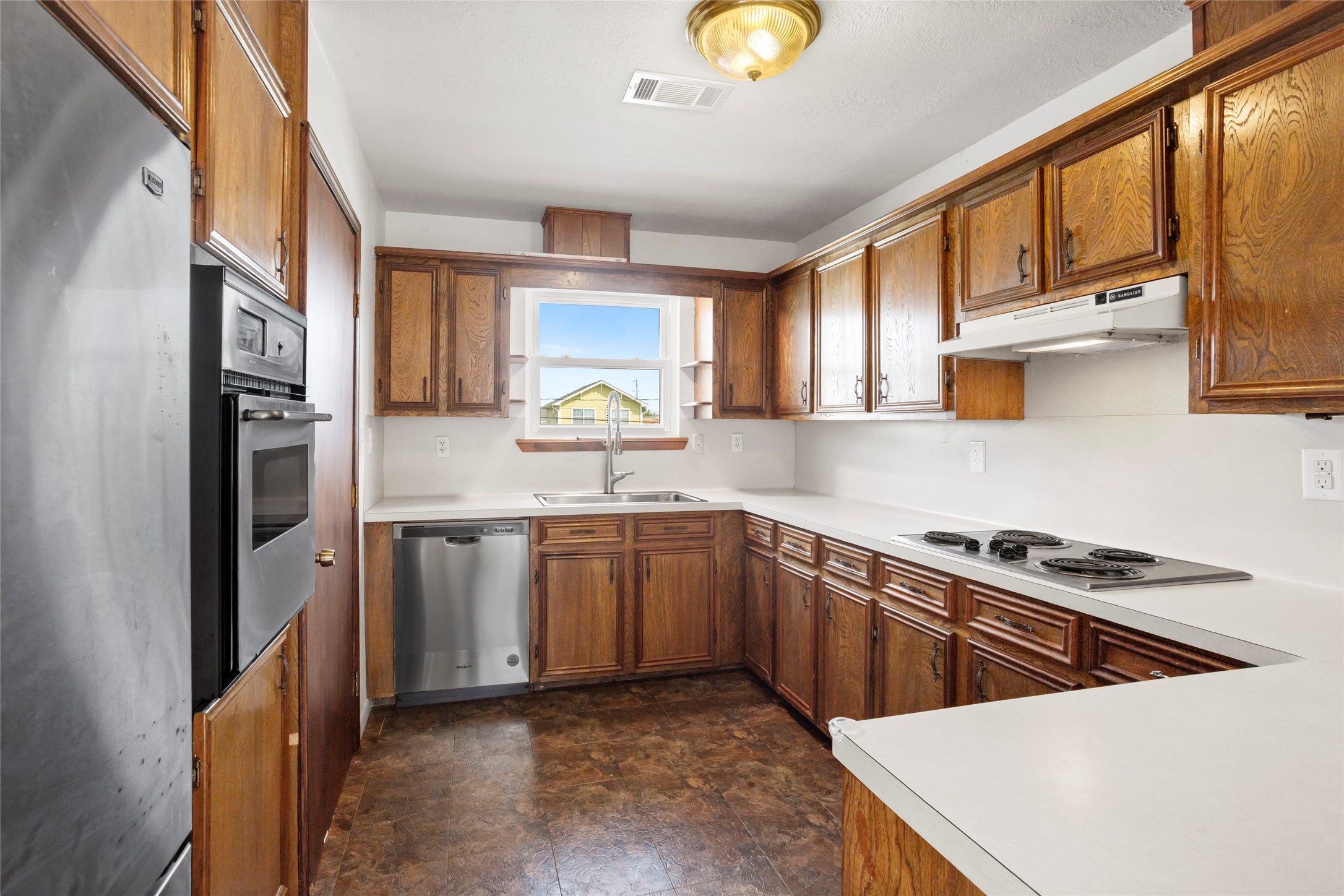 Modern stainless steel appliances and abundant storage space. Modern stainless steel appliances and abundant storage space.