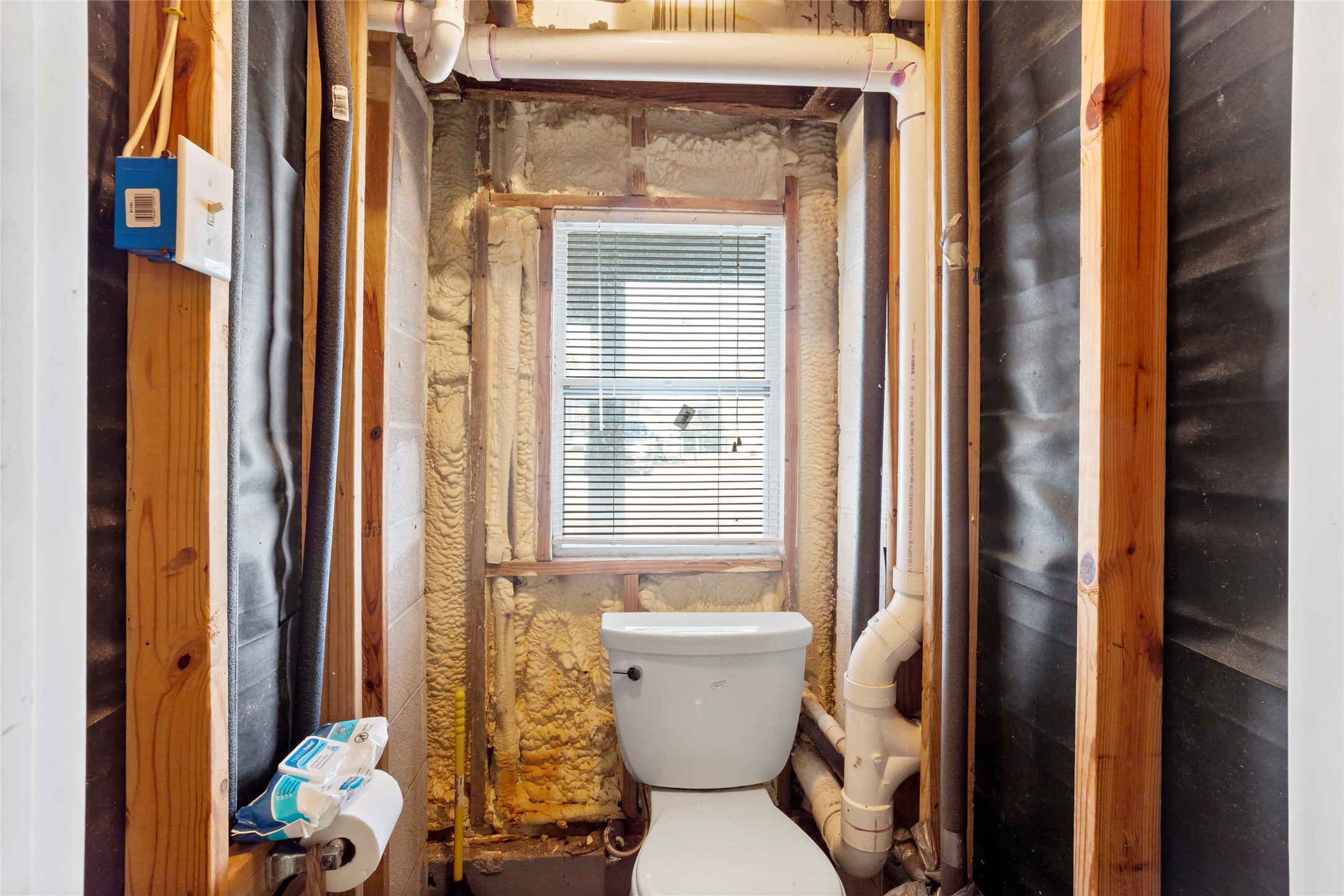 Convenient ground-level bathroom located in the garage for easy access.