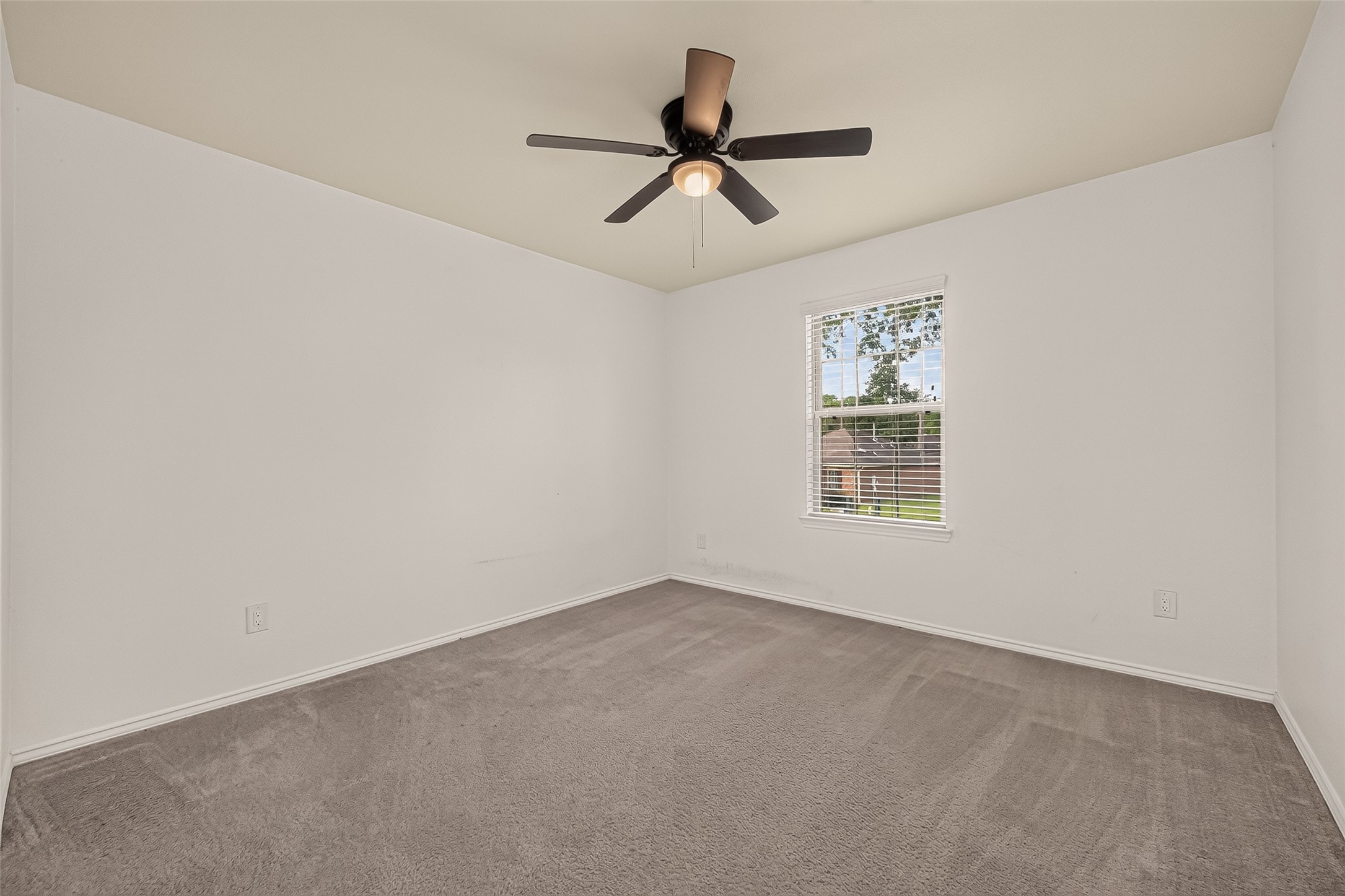 Second-floor Secondary Bedroom #2 provides a cozy and adaptable space, perfect for guests, family members
