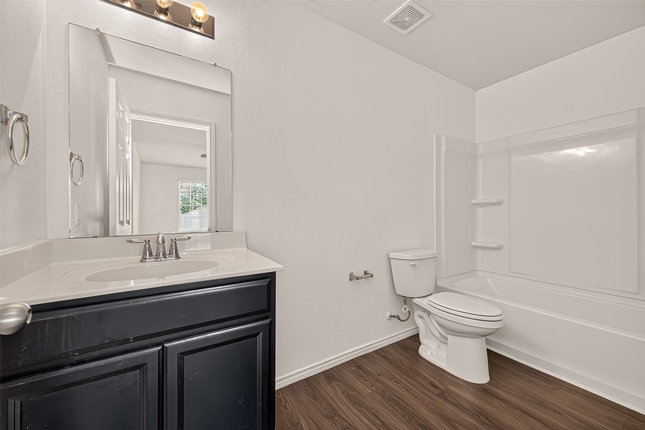 Second floor secondary bathroom with bath/tub combo
