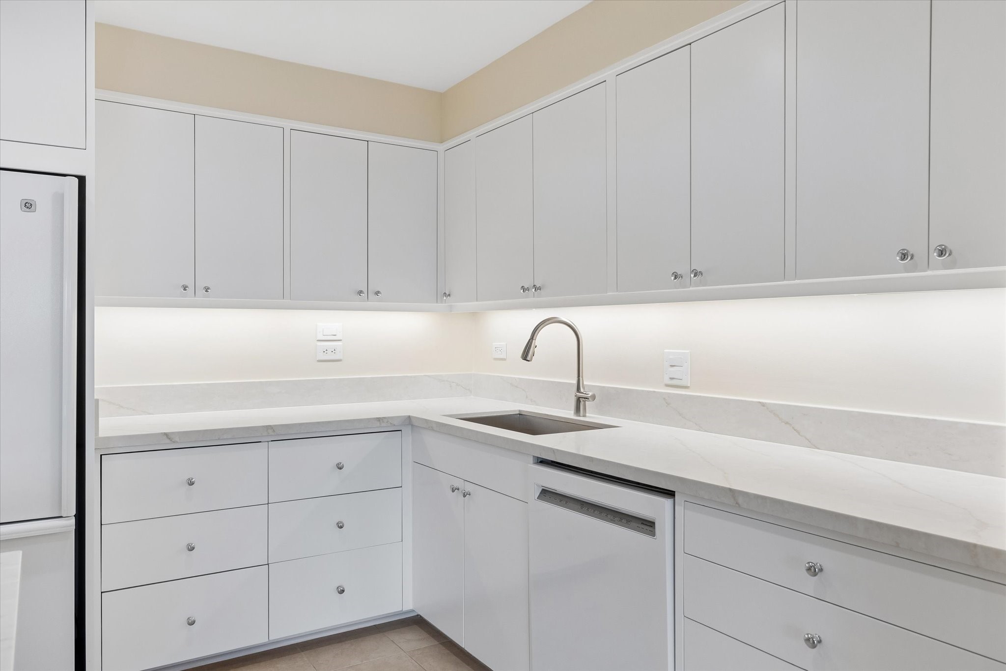 Kitchen with new granite countertops and custom cabinetry