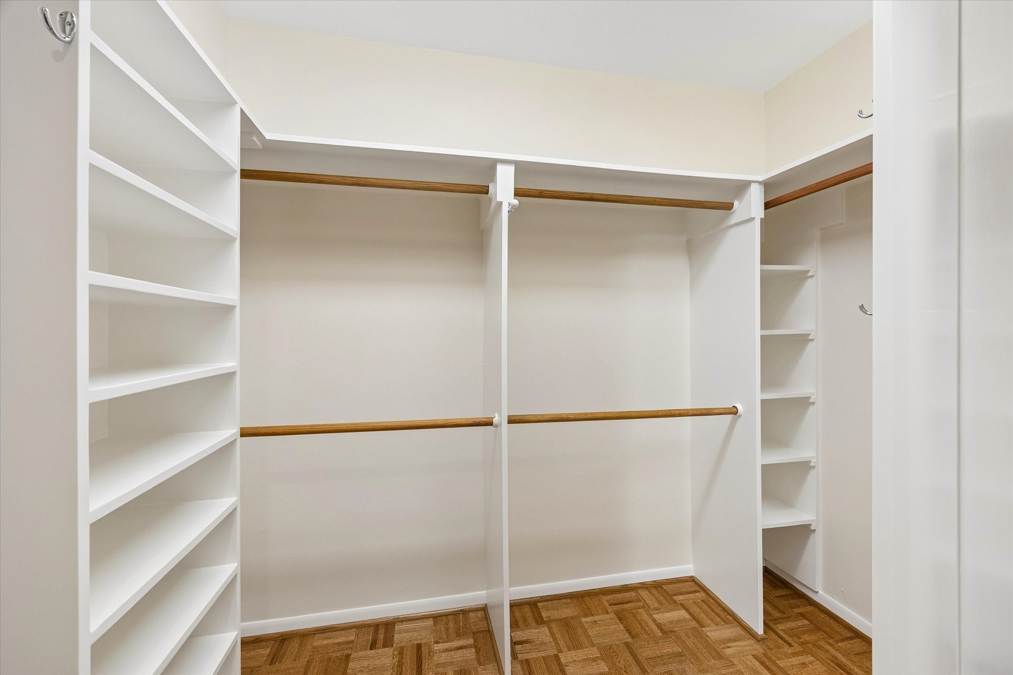 Large Master Closet with custom shelving