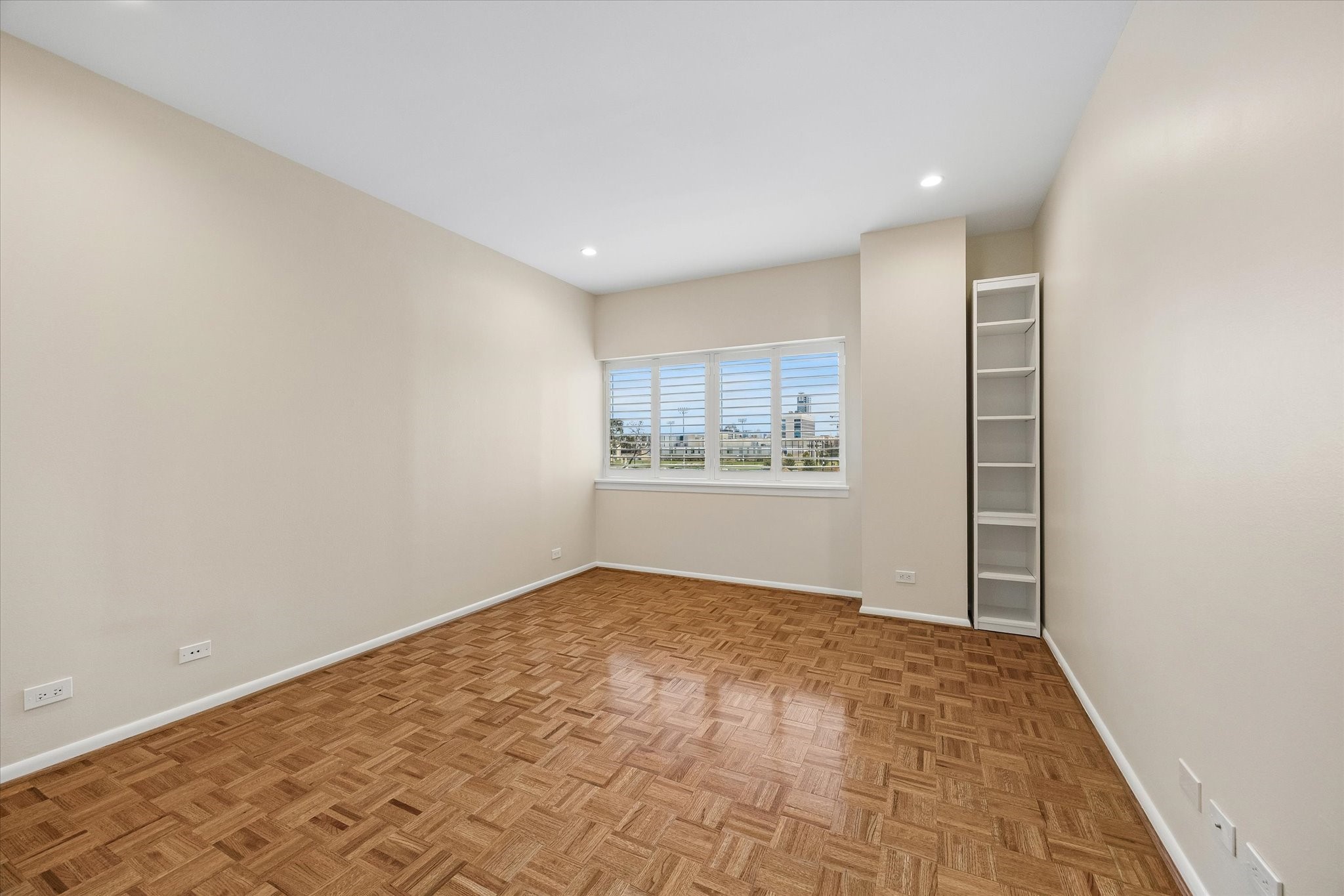 Large 3rd Bedroom (11.8 x 16.9) with plantation shutters