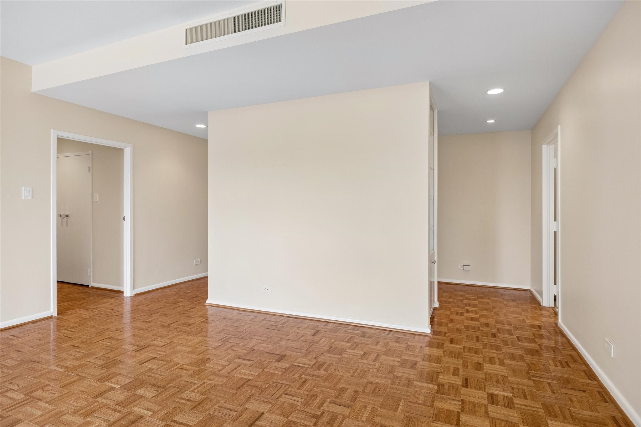 Large Living Room looking towards entry door and hallway to bedrooms