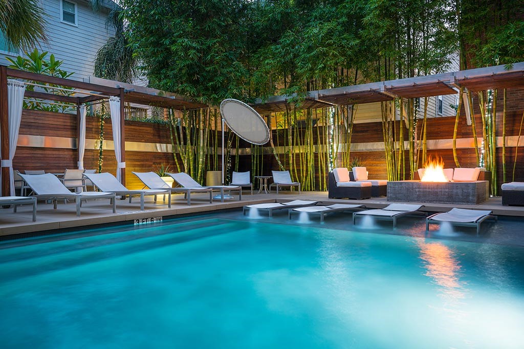 This is one of 2 pools you can enjoy in this boutique hotel feel property spread over 3 blocks. Being this spread out allows for more privacy. Residents can use either pool, fitness center, lobbys, WFH spots or the outdoor areas.  If you arent represented by a Realtor and chose to work with me, I can credit your application fee and provide other specials. Text, DM or call me .