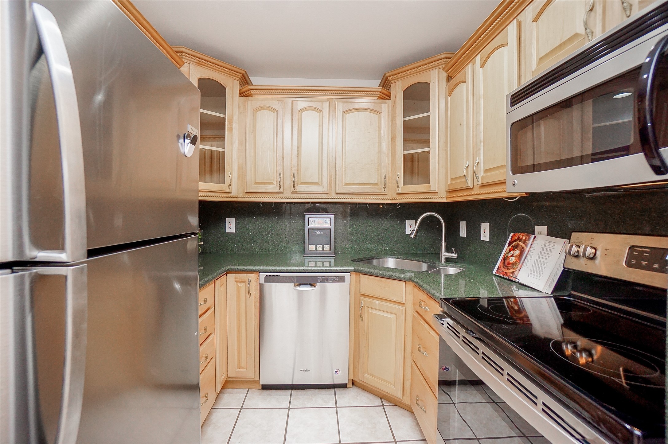 Kitchen with stainless appliances.