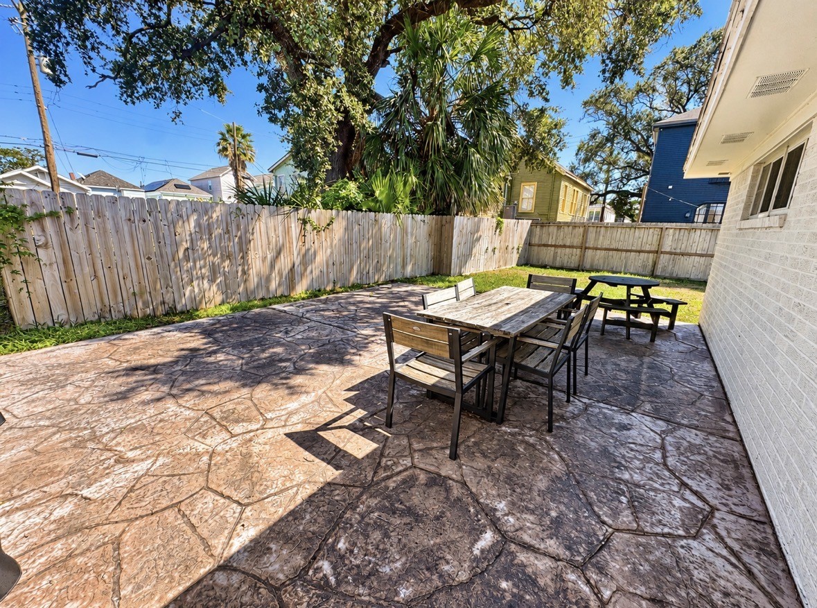 Another view of the spacious patio and side yard.