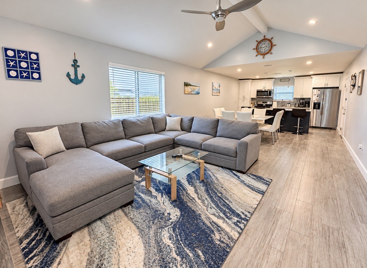 View into Living, Dining and Kitchen.