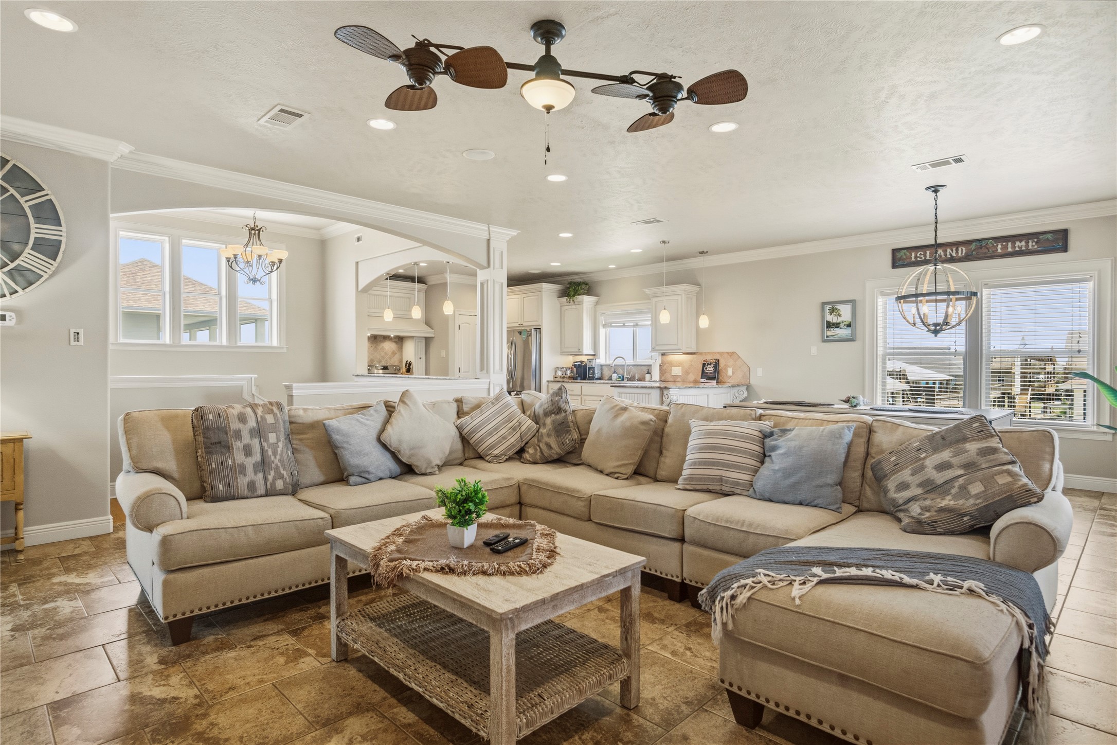 Gather the whole crew in this spacious living room, where the open layout keeps meals, games, and conversation flowing together. Gather the whole crew in this spacious living room, where the open layout keeps meals, games, and conversation flowing together.