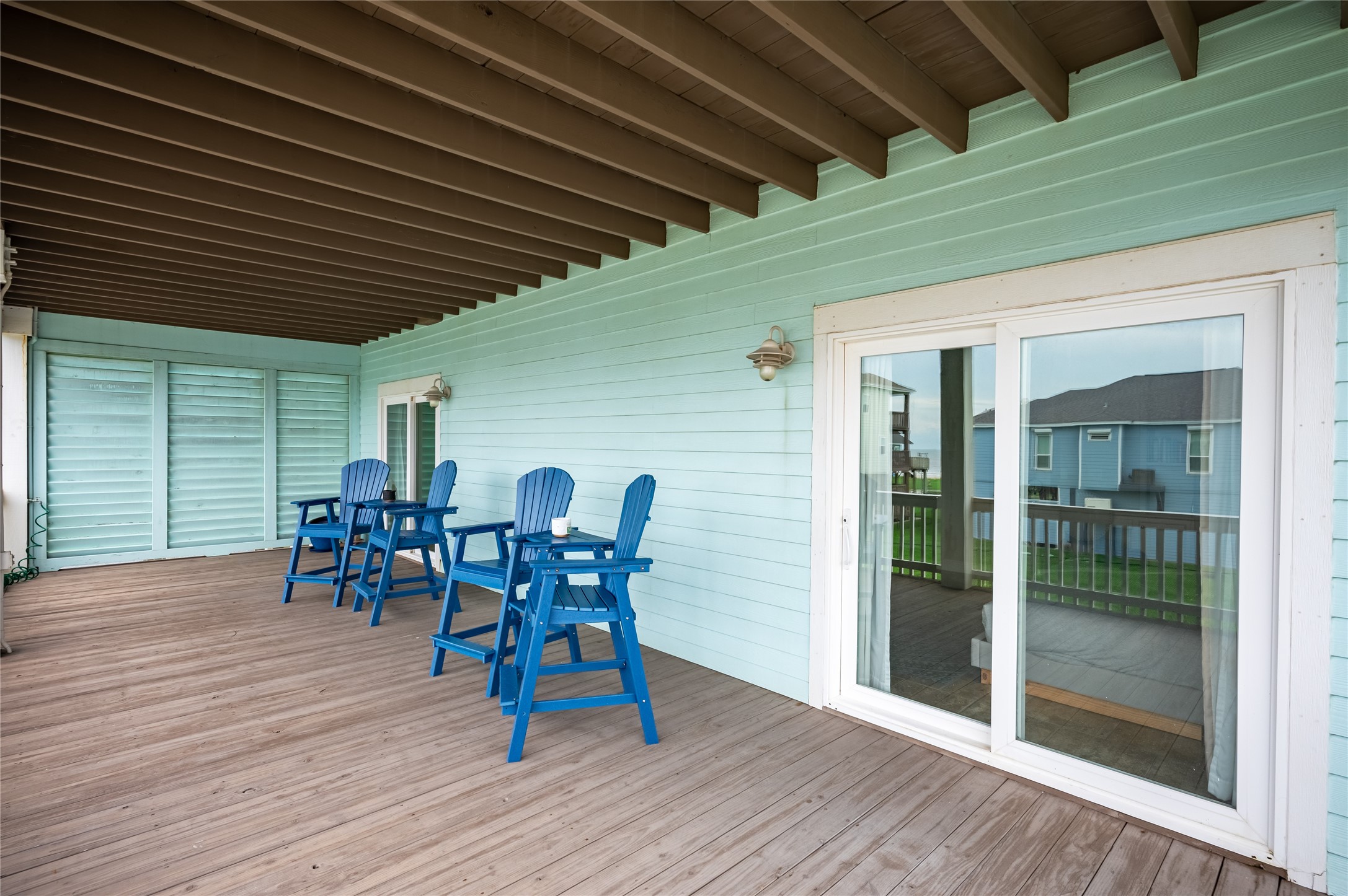 Slide open the doors from your bedroom and enjoy a private covered retreat made for slow mornings and breezy evenings.