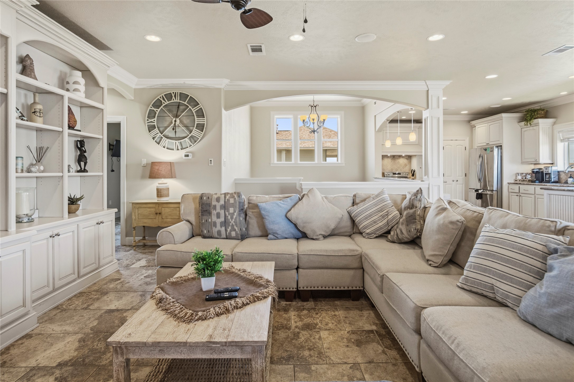 The open living area gives everyone room to settle in, with built-ins and an easy connection to the kitchen and dining spaces. The open living area gives everyone room to settle in, with built-ins and an easy connection to the kitchen and dining spaces.