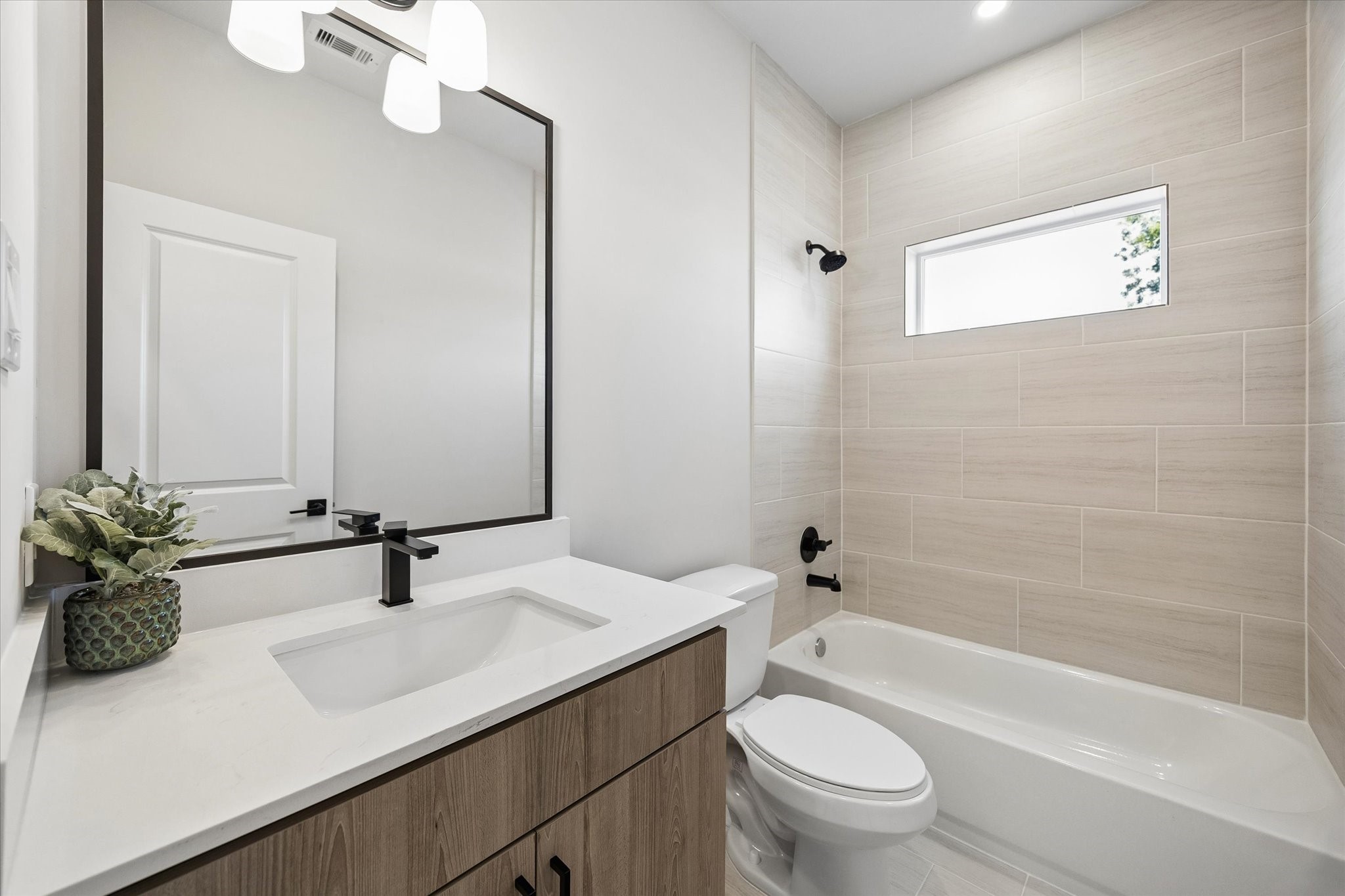 This photo is of the Haven at Highland Model Home at 6702 Zaken (Floor Plan B), and may depict upgrades not included in the standard finishes for this listing.