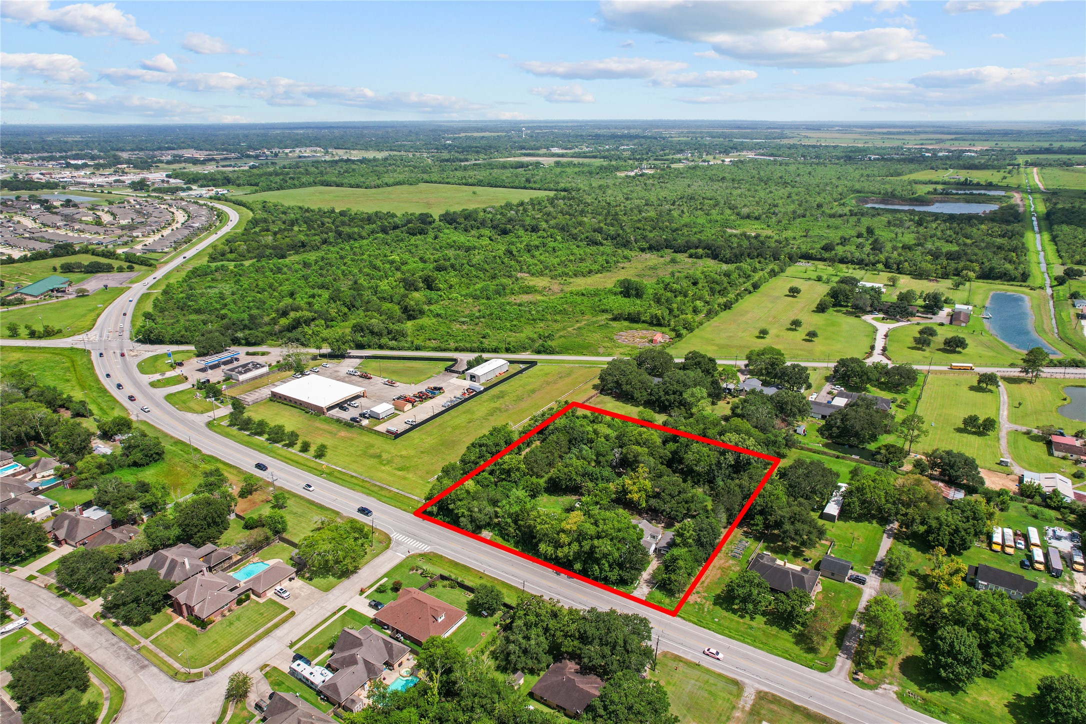 Aerial view highlights the property's proximity to Hwy 35, established commercial activity and the proposed Grand Parkway corridor. Aerial view highlights the property's proximity to Hwy 35, established commercial activity and the proposed Grand Parkway corridor.