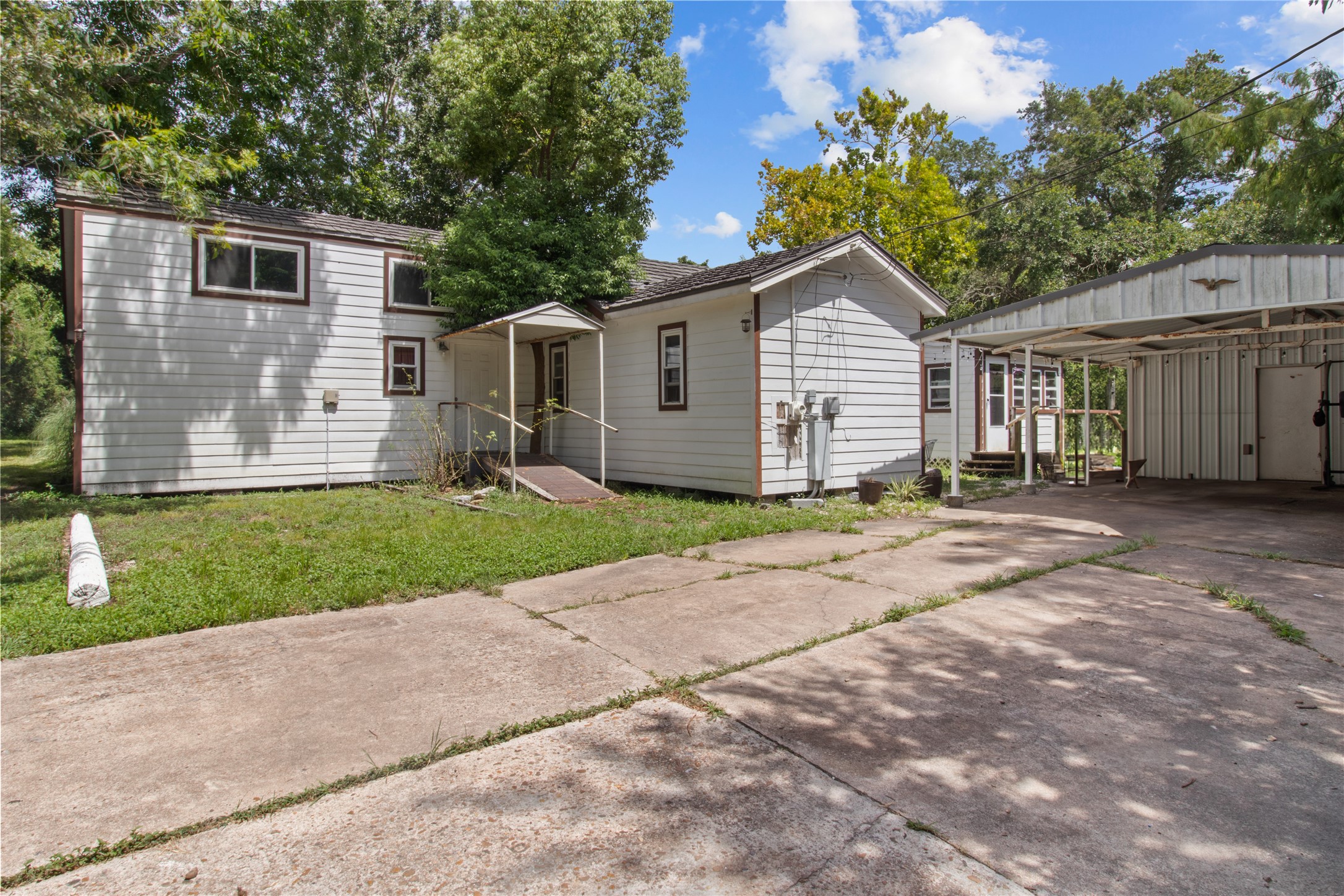 Existing residence on the property provides additional possibilities for an investor or owner-user while evaluating the property's long-term potential.