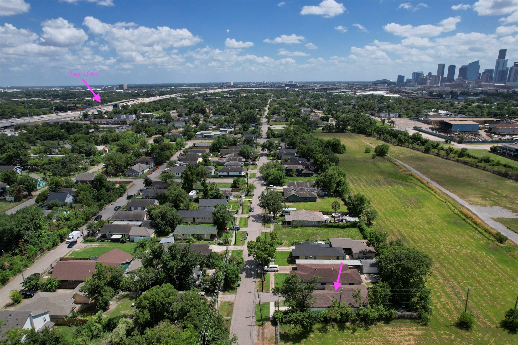 Aerial perspective showing proximity to Hwy 59, Downtown, and the Heights