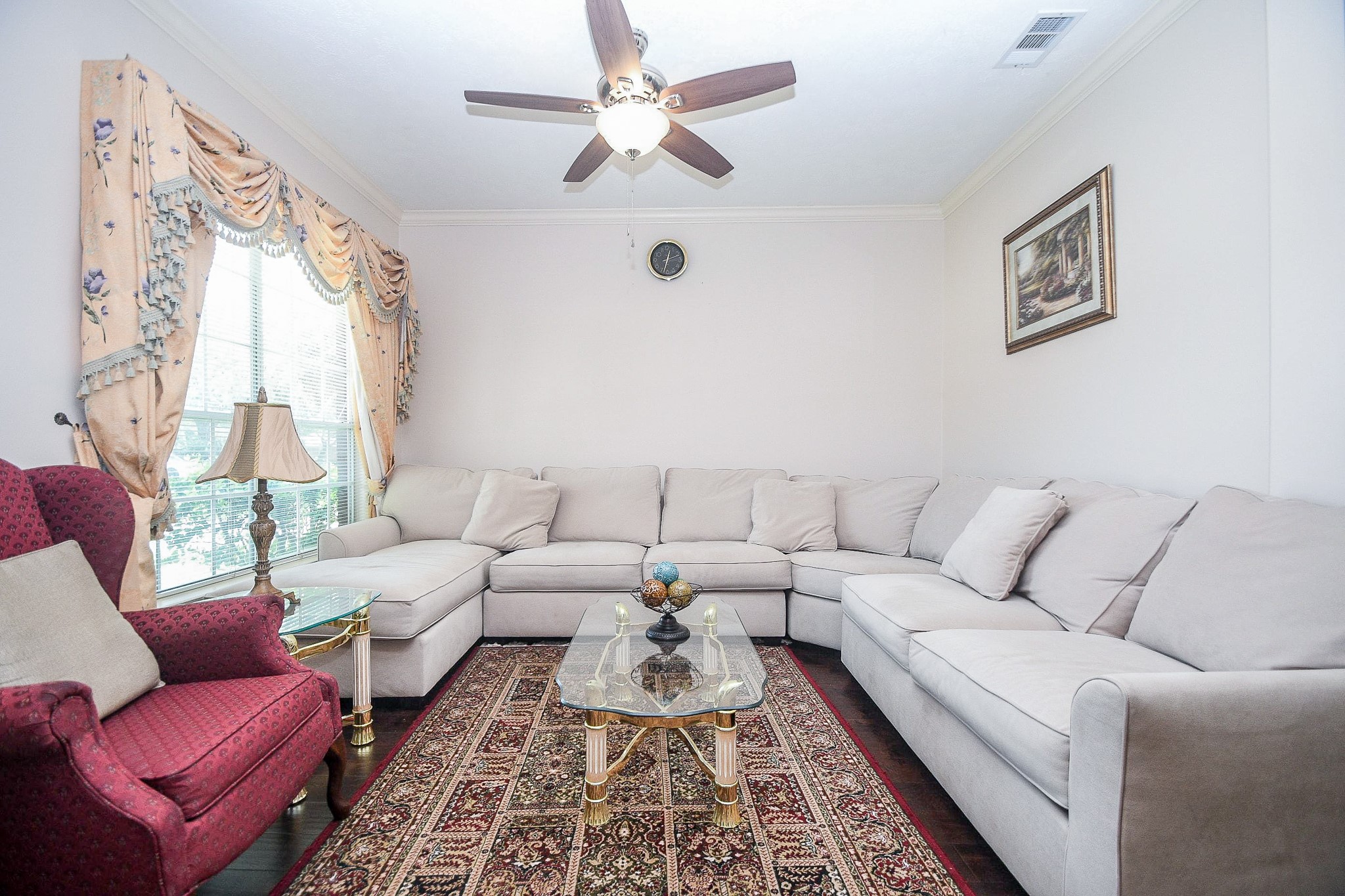 Bright and inviting formal living room, perfect for entertaining your guests.