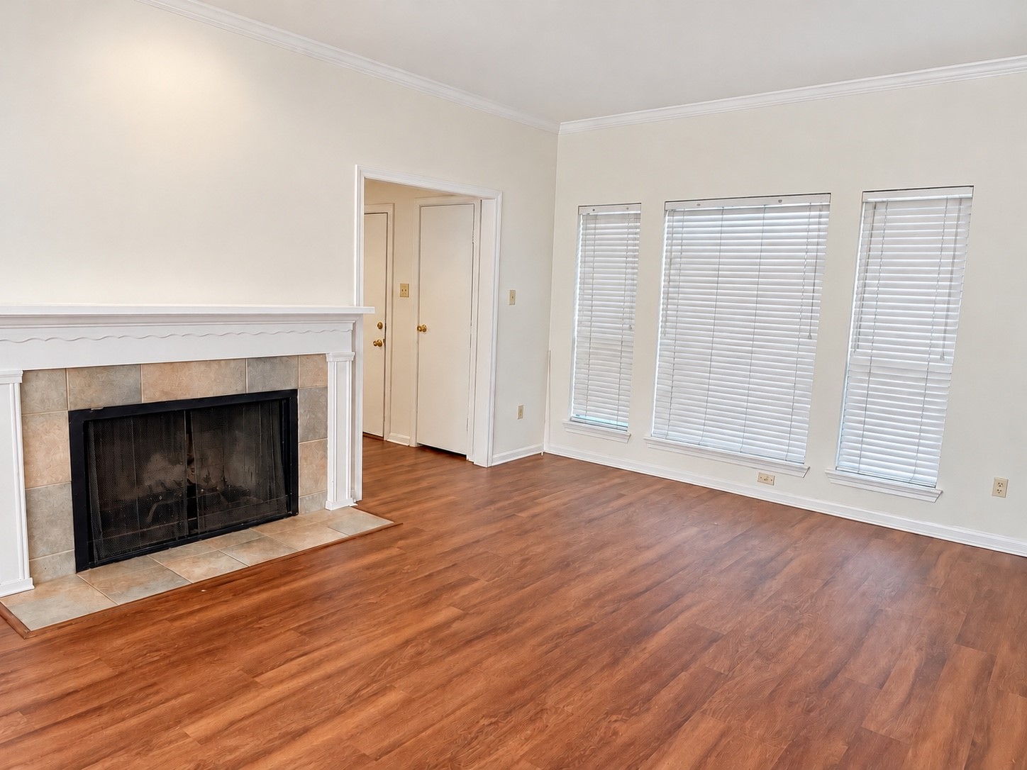 Inviting living room with tile-surrounded Fireplace