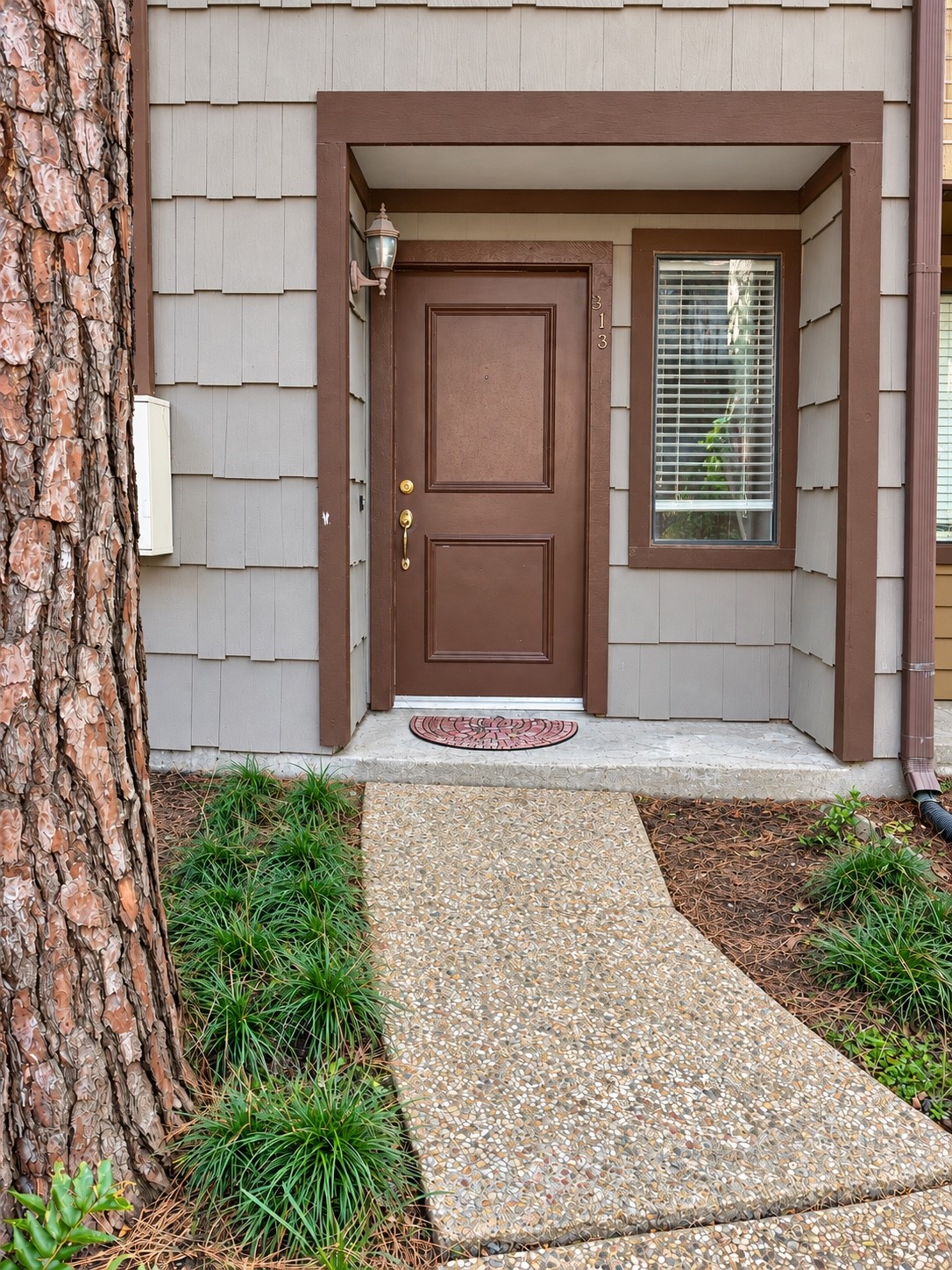 Covered entry with Charming walkway into your New Home #313