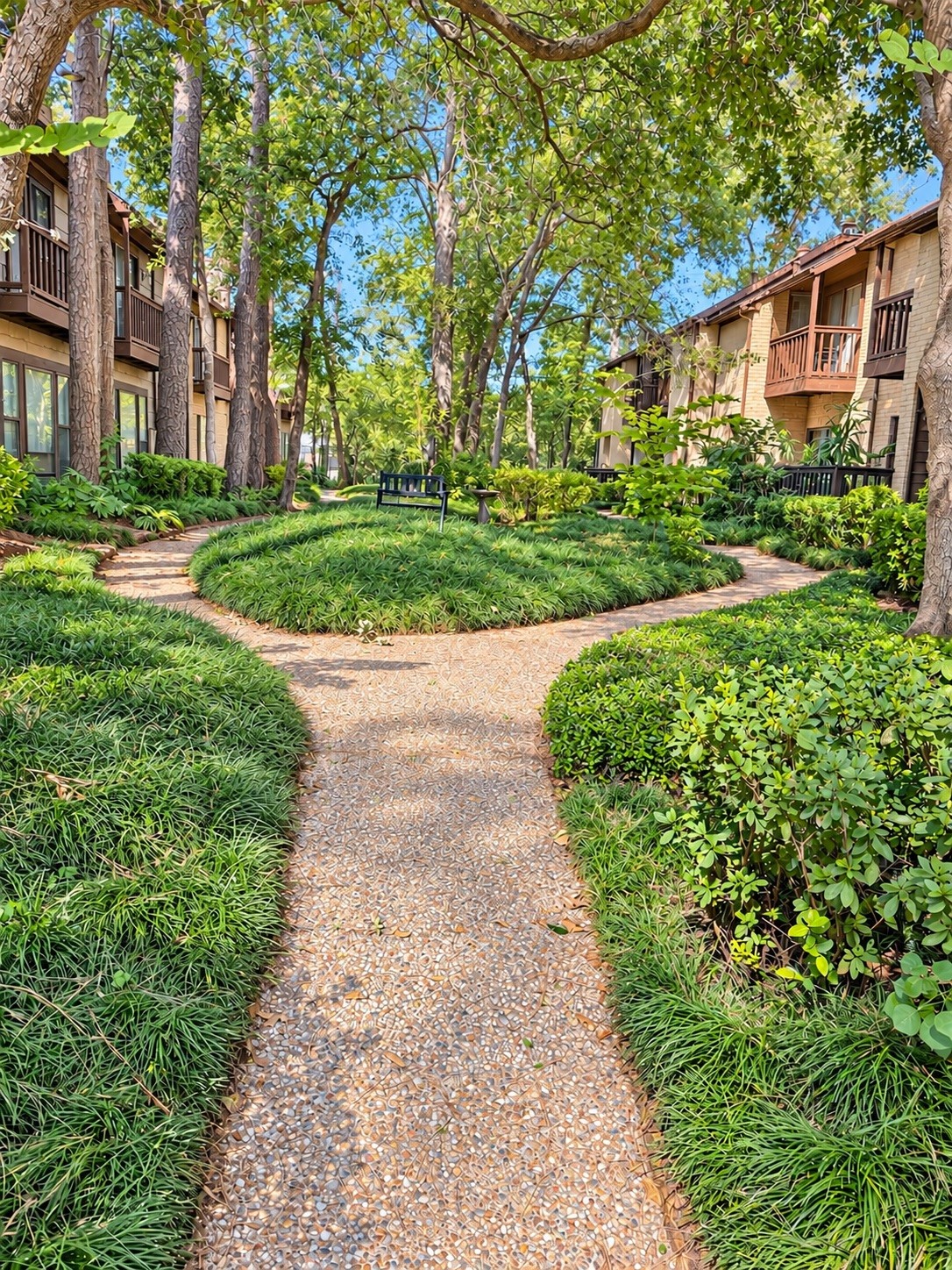 Inviting Courtyard with winding walkways,Lush landscaping, a peaceful sitting area