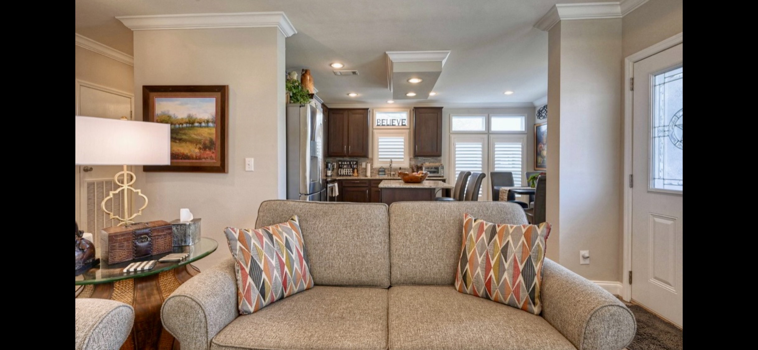 Open kitchen/living layout creates an easy flow for everyday living & entertaining, complemented by upgraded flooring & coordinated finishes throughout.