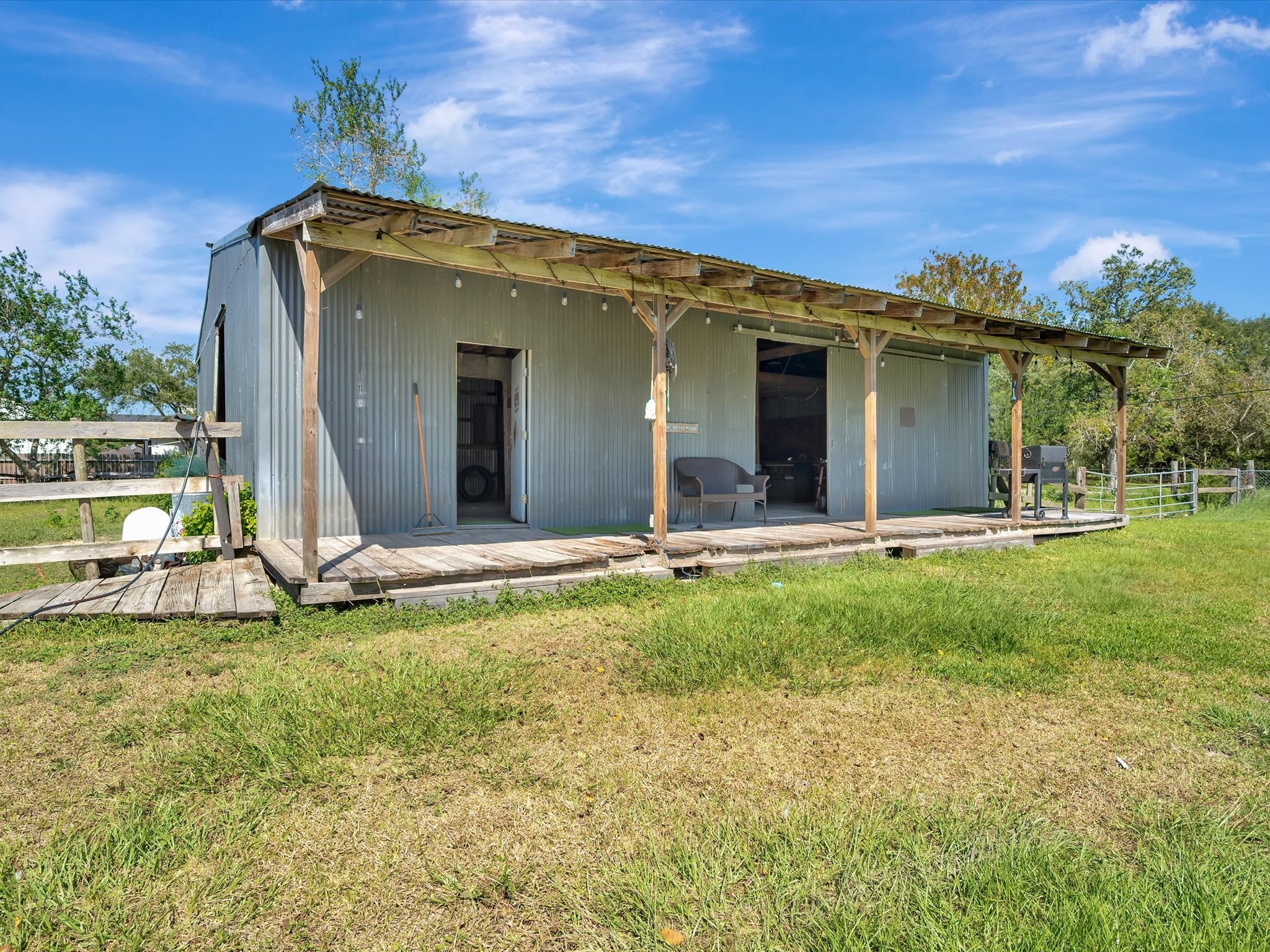 Front porch view of the barn and shop.