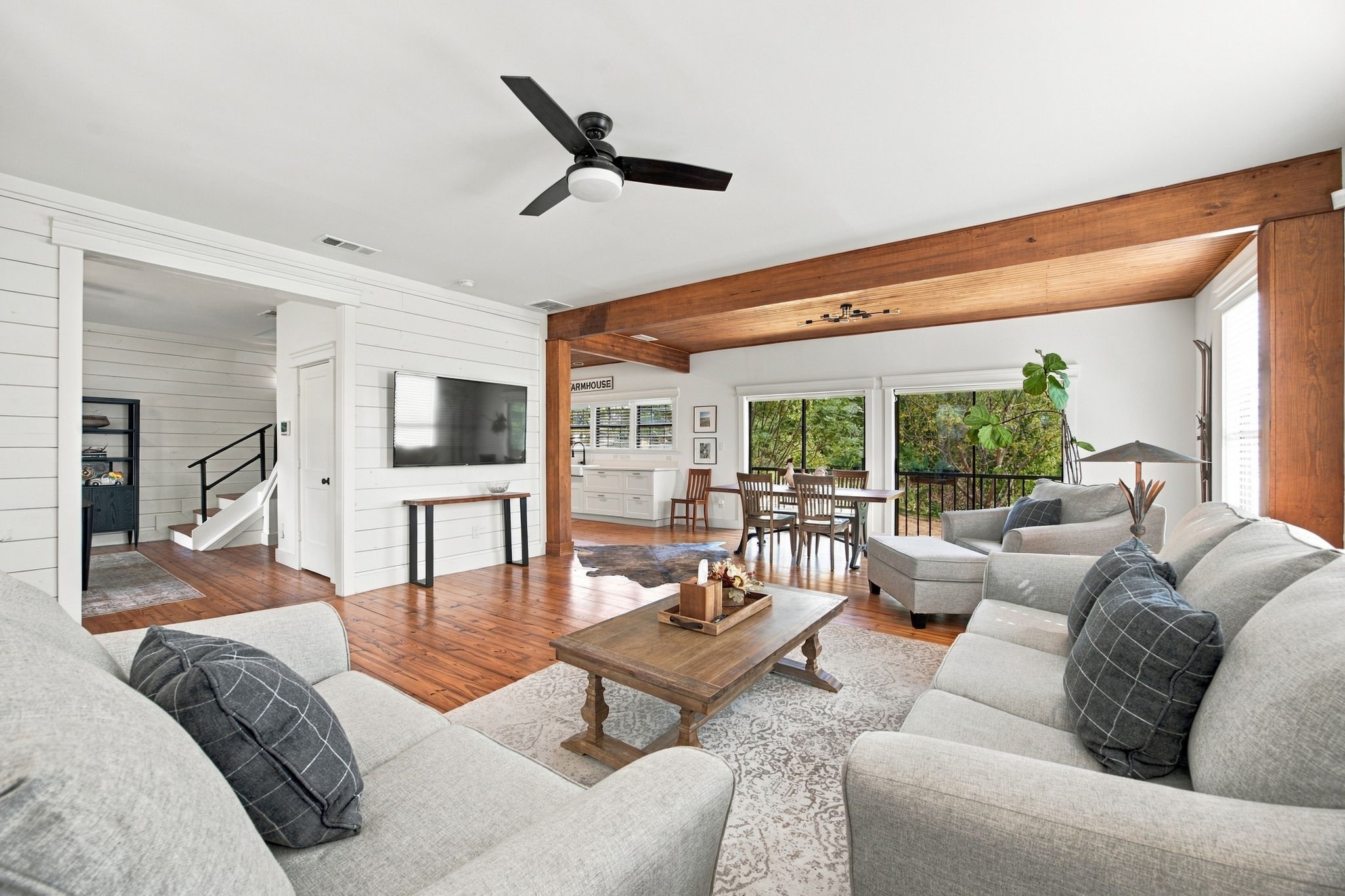 Open concept with pine floors and wood accents Open concept with pine floors and wood accents
