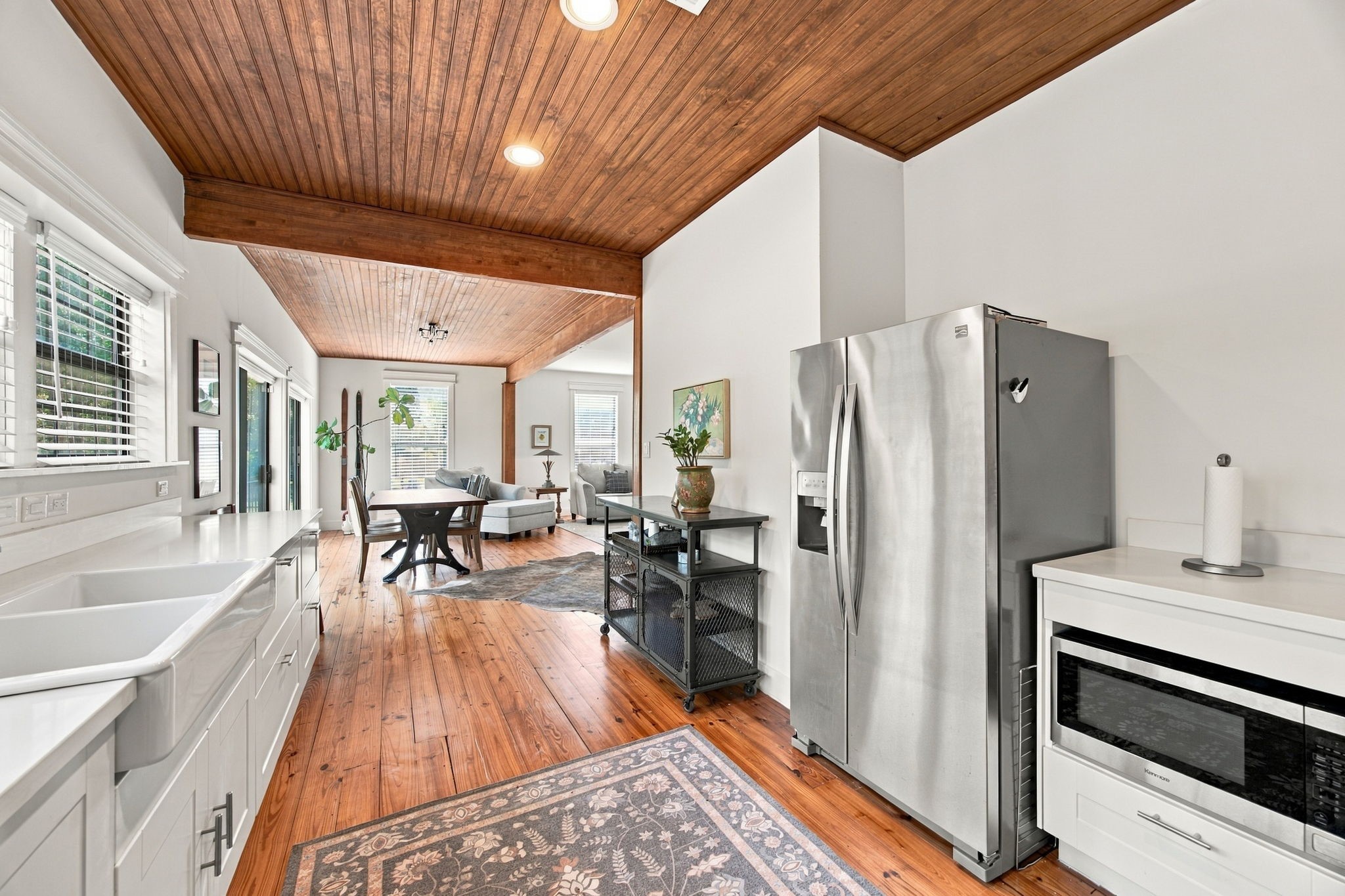 Kitchen was remodeled and opens up to the dining and living room. Overlooks the backyard. Kitchen was remodeled and opens up to the dining and living room. Overlooks the backyard.