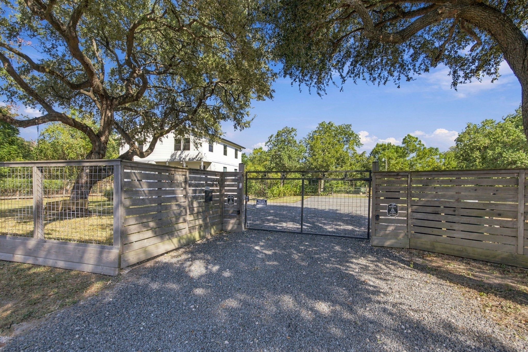 Private and gated property. Motorized gate and a gorgeous oak tree greet you as you enter. Private and gated property. Motorized gate and a gorgeous oak tree greet you as you enter.