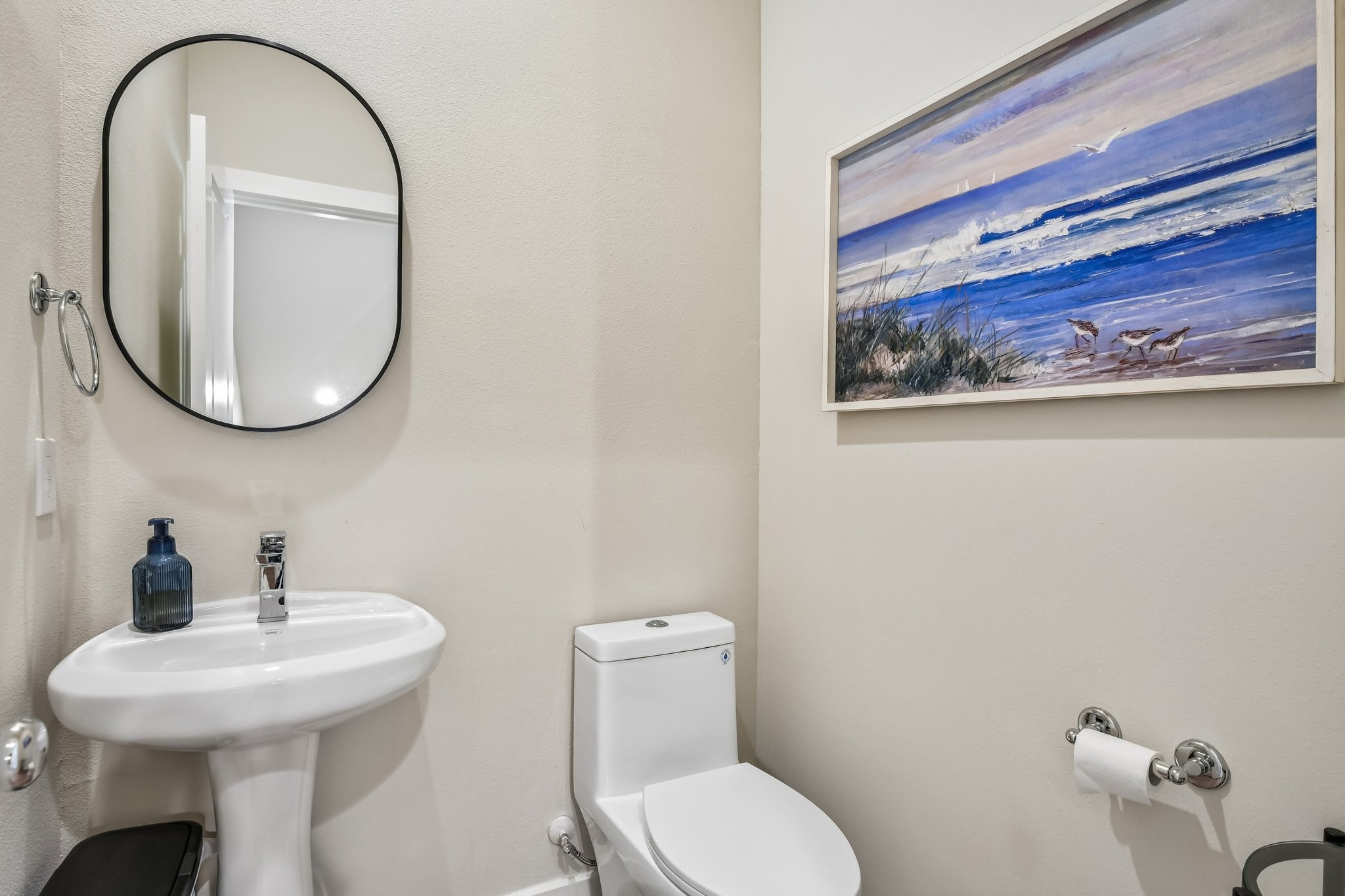 Half bath located on the second floor near stairway