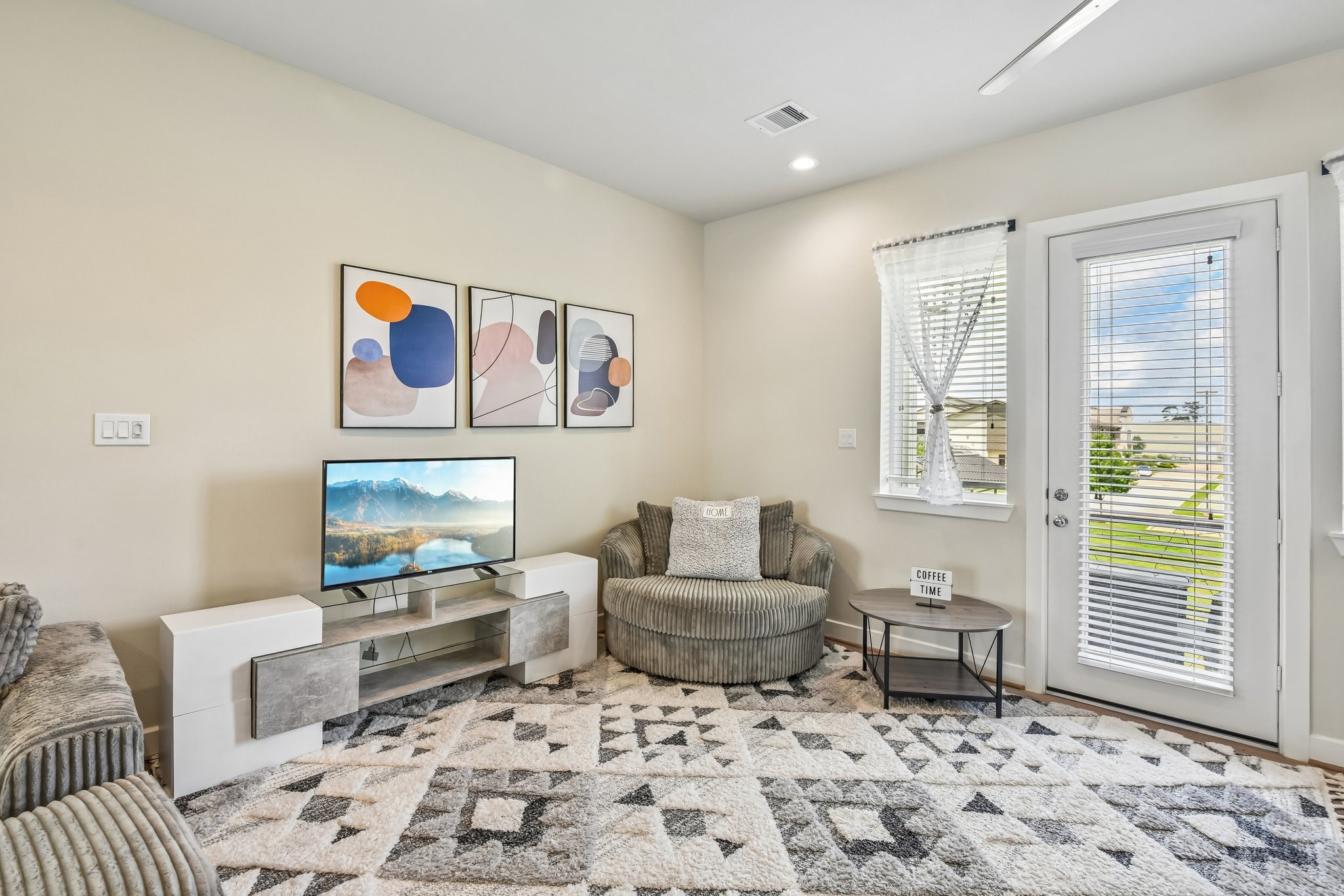 Living room with natural light that leads to the balcony Living room with natural light that leads to the balcony