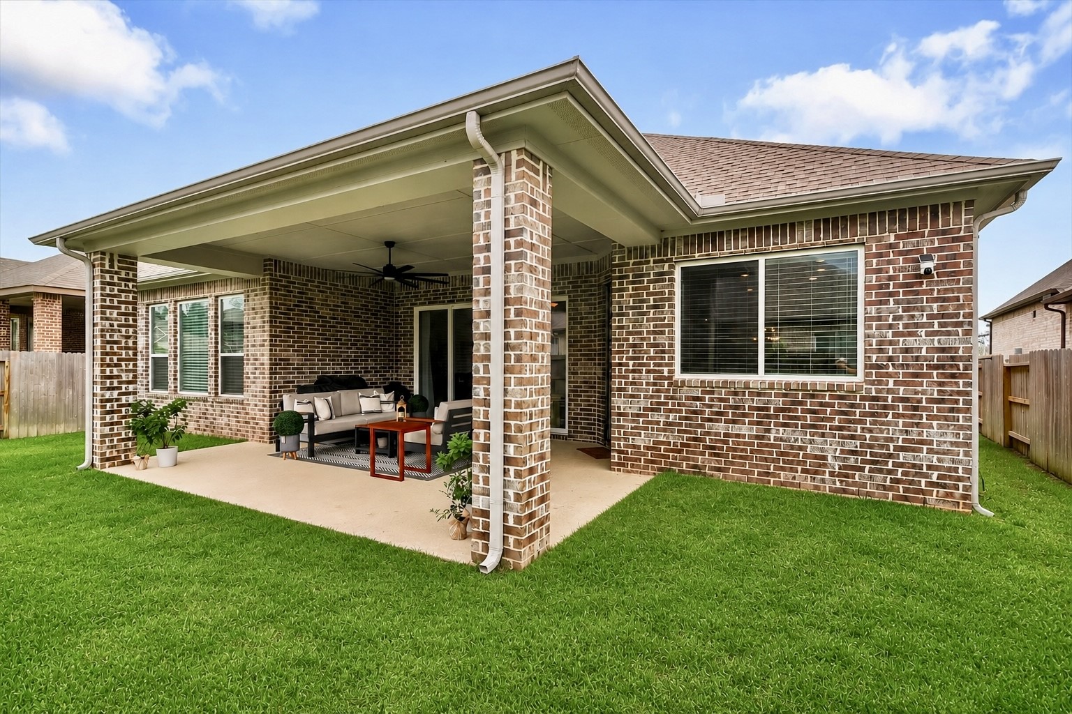 spacious covered patio, perfect for outdoor relaxation and entertaining