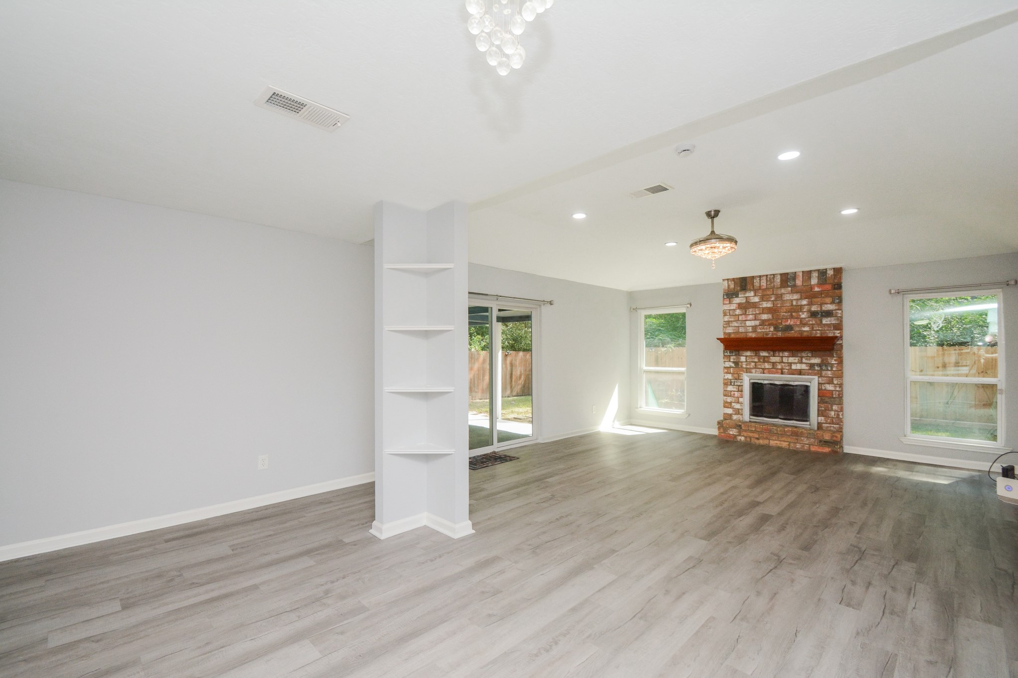 View from the kitchen overlooking the dining & den area. View from the kitchen overlooking the dining & den area.