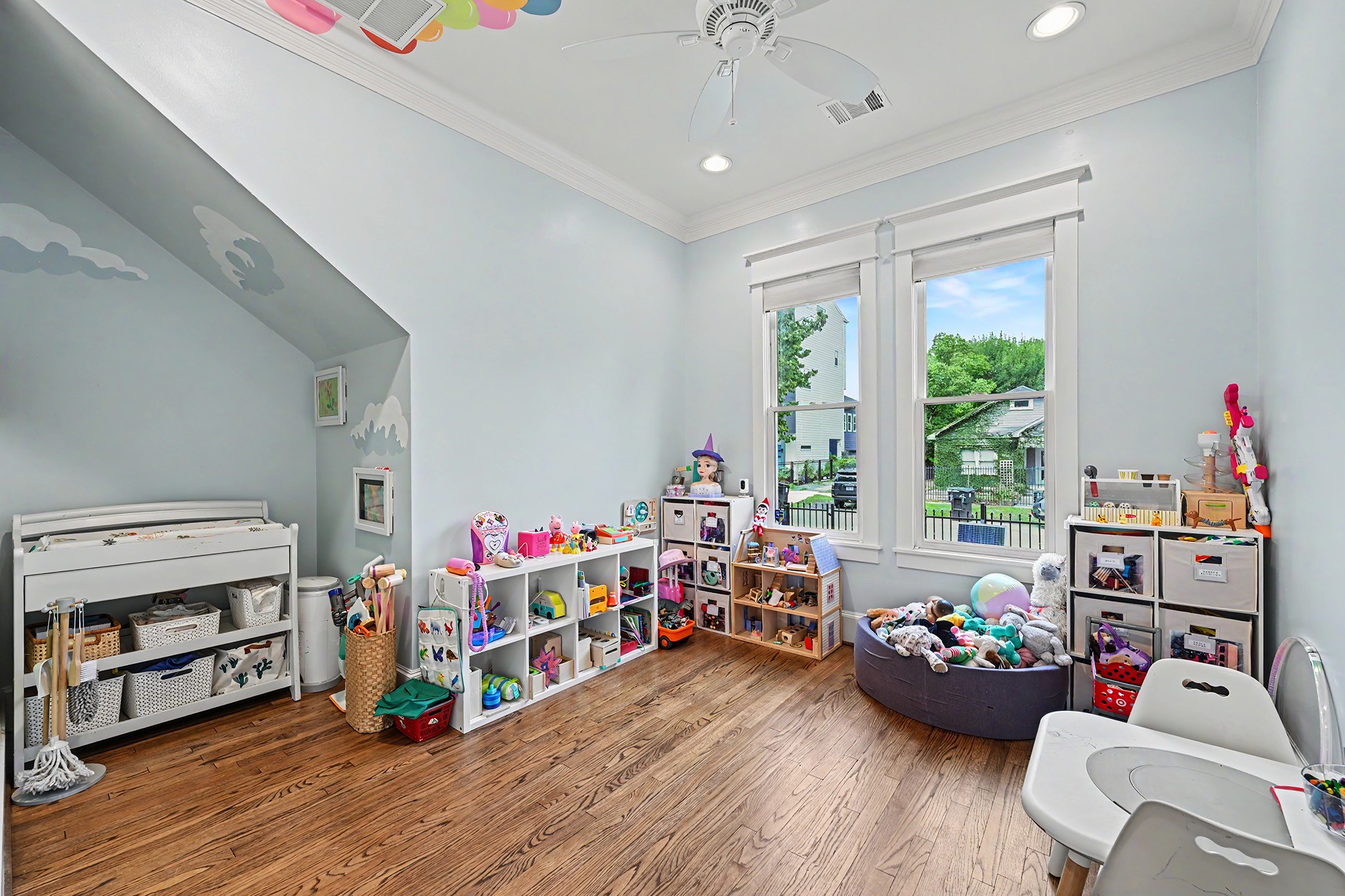 Downstairs playroom/home office is off the family room to provide a versatile space for your needs.