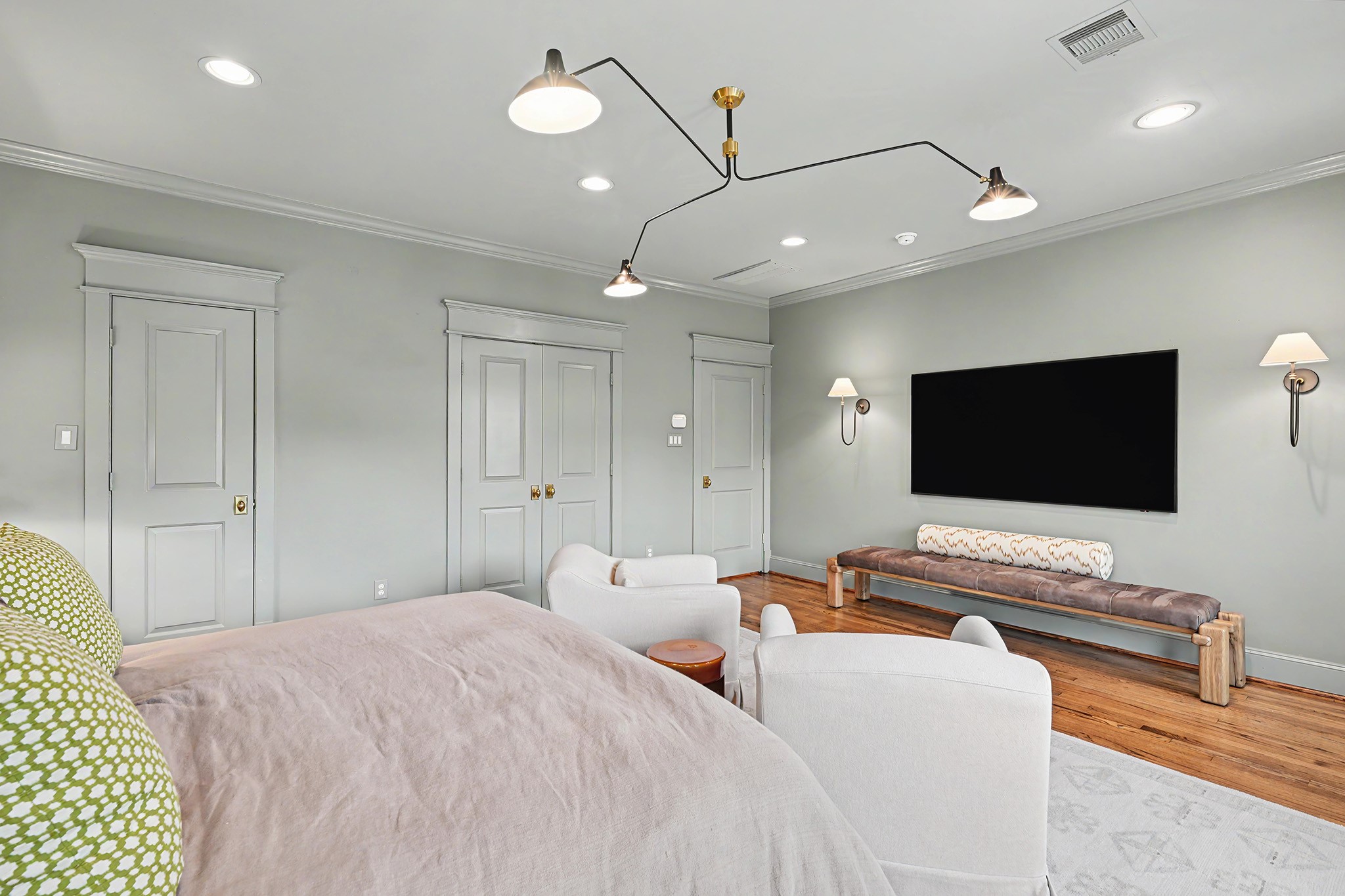 Second look at this elegant primary bedroom that is a true retreat.