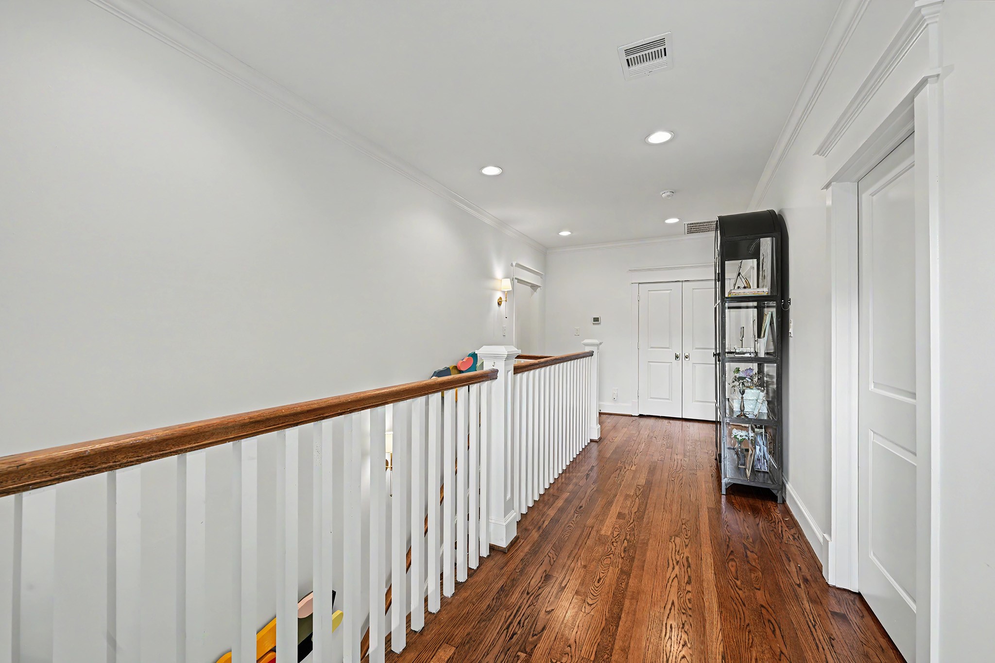 Second floor is bright and airy. From here the secondary bedrooms are to the right, linen closet straight ahead, vestibule to the left which leads to the laundry room and primary bedroom.