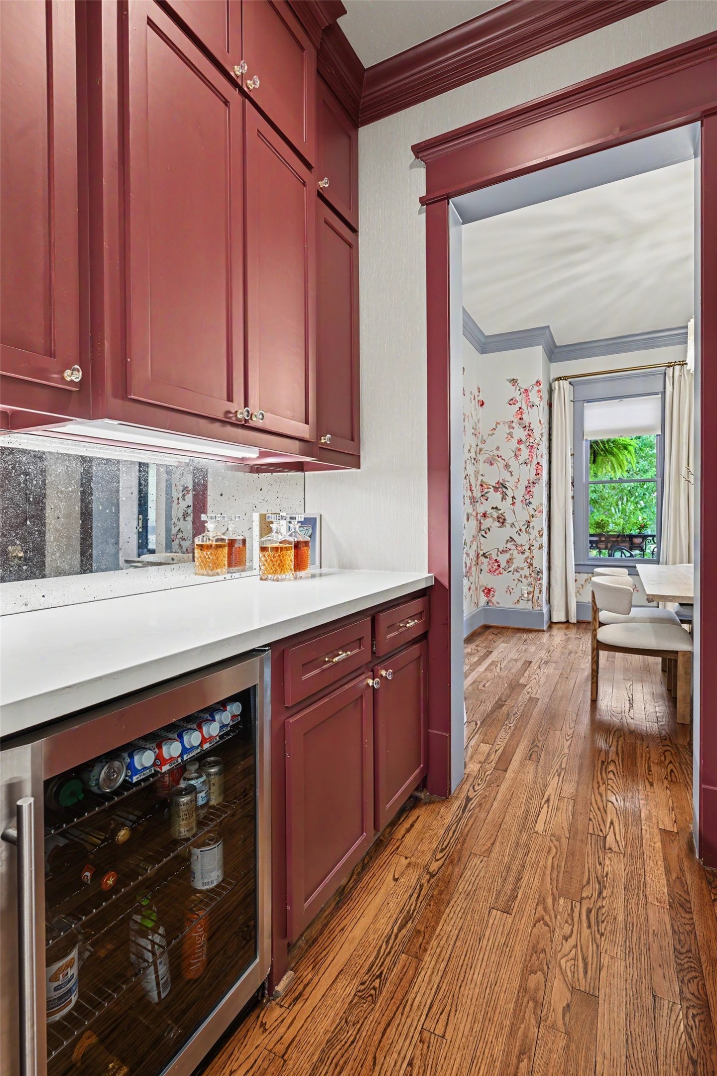 Butler's pantry connects the kitchen to the dining room. Wine cooler, dry bar plus there's a walk-in pantry.