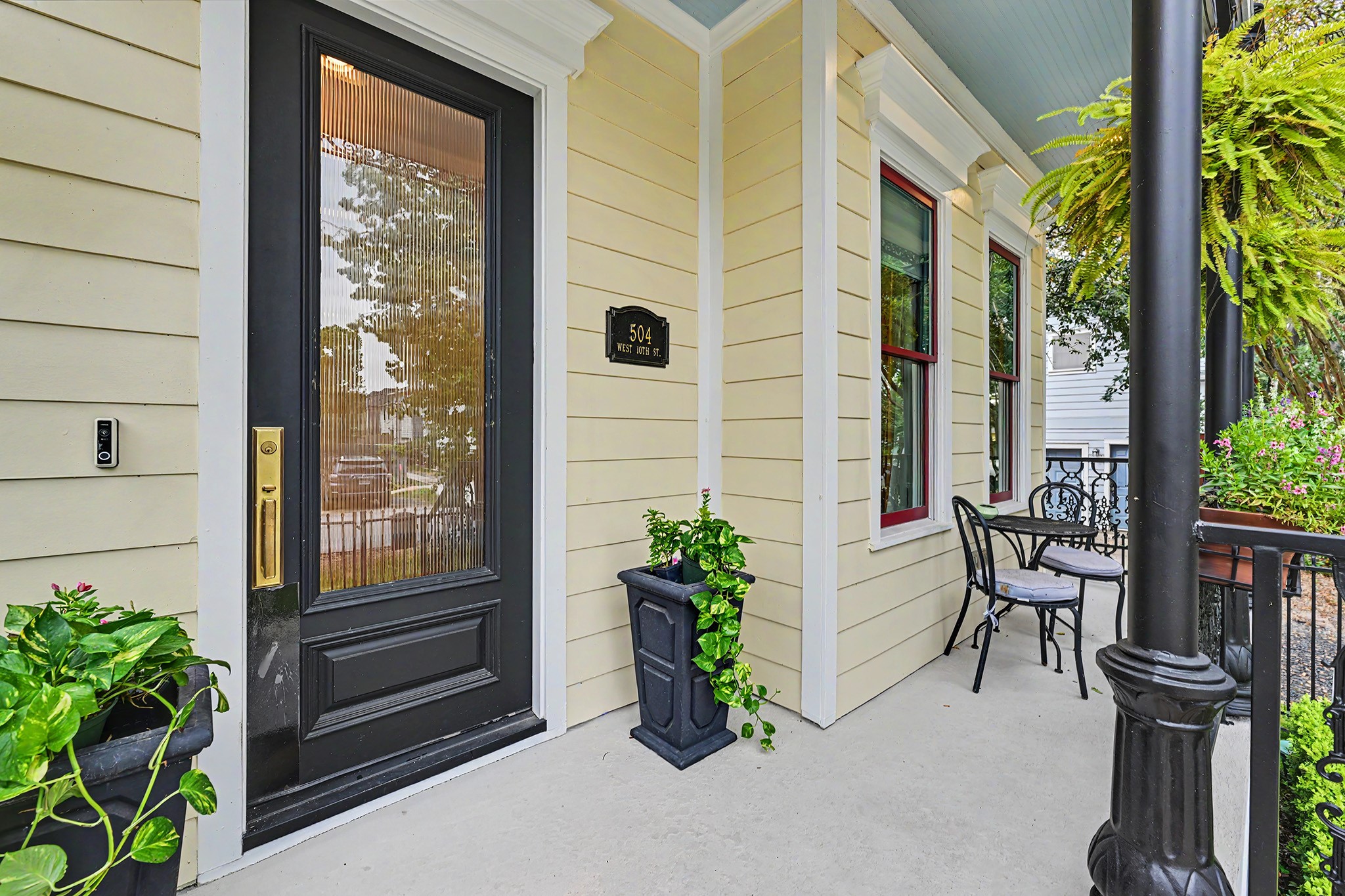 Inviting front porch emphasizes the New Orleans inspired build of this home. Relax and enjoy conversation with neighbors passing by. Recently painted exterior/per seller. Inviting front porch emphasizes the New Orleans inspired build of this home. Relax and enjoy conversation with neighbors passing by. Recently painted exterior/per seller.