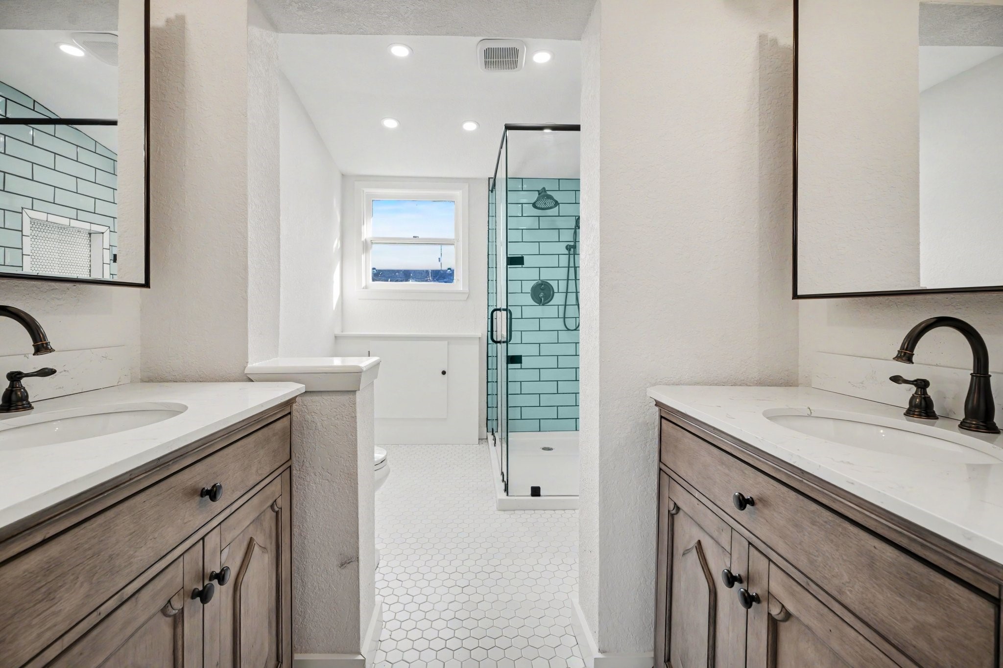 Completely updated primary bathroom en suite with double sinks