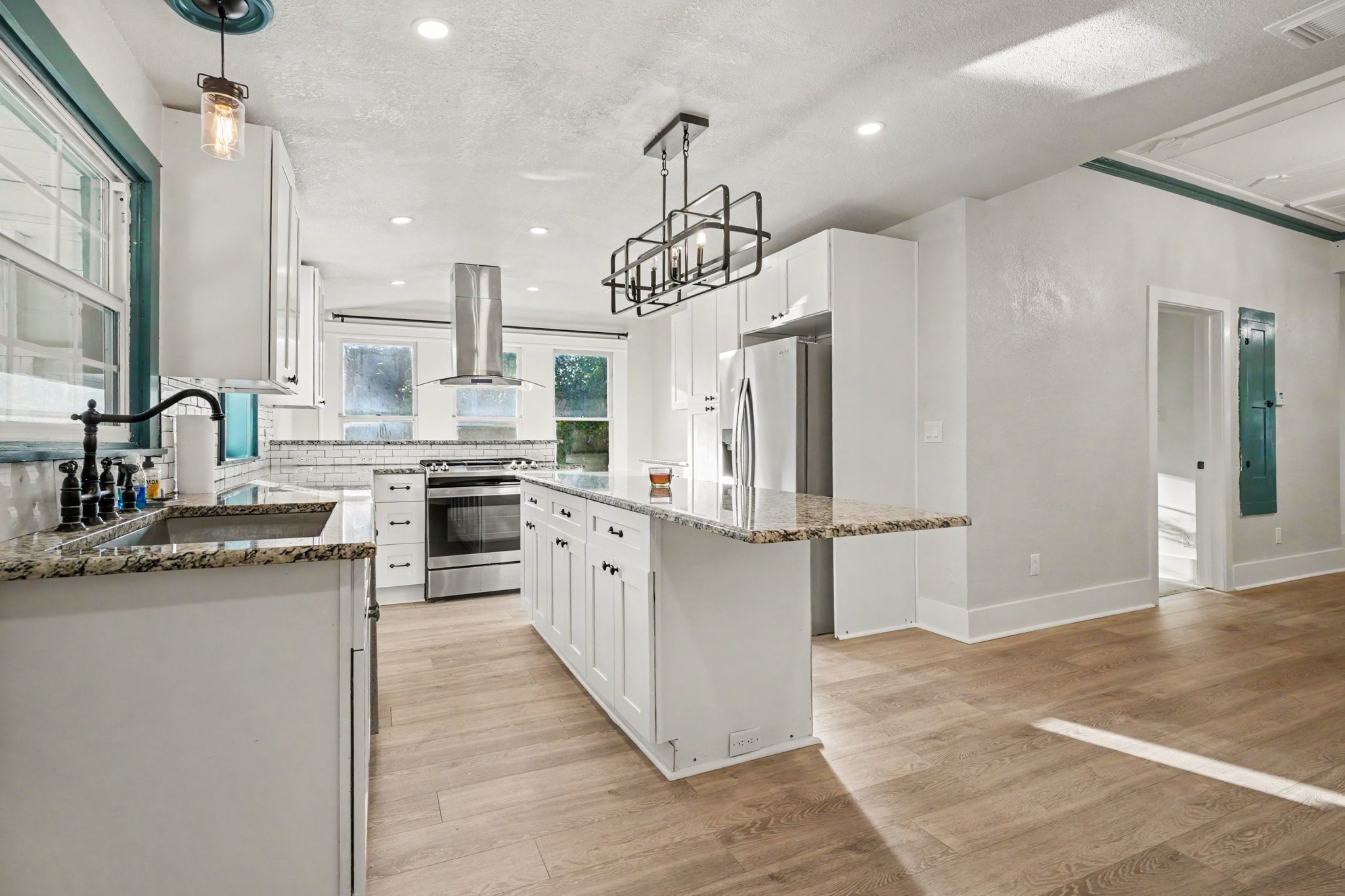 Large island with natural lighting throughout